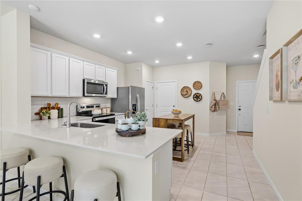Living room with patio access at 2742 Fetching Trail