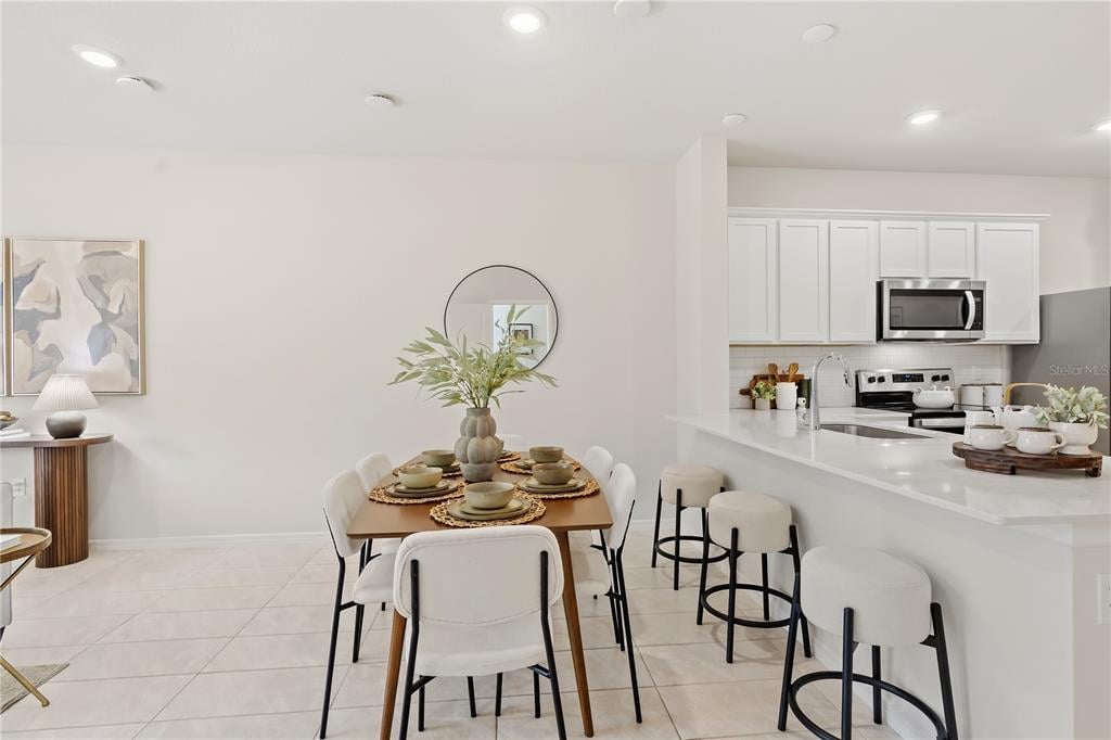 Dining area and kitchen at 2742 Fetching Trail