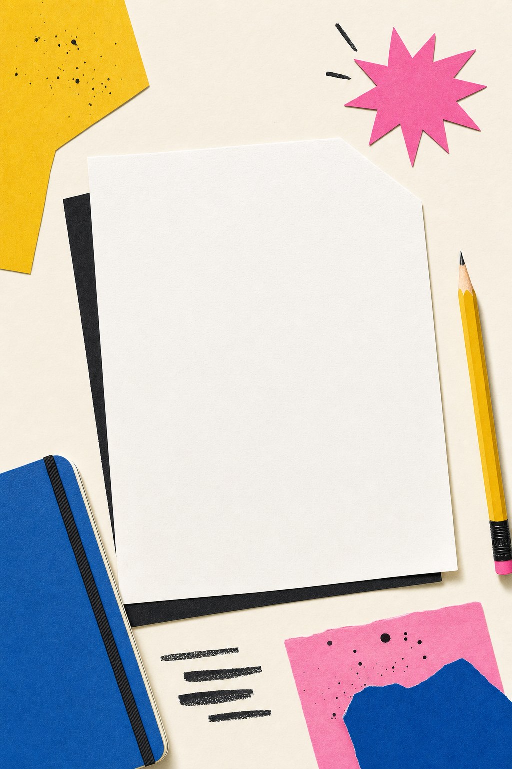 Blank resume page with a pencil, notebook, and colorful paper shapes