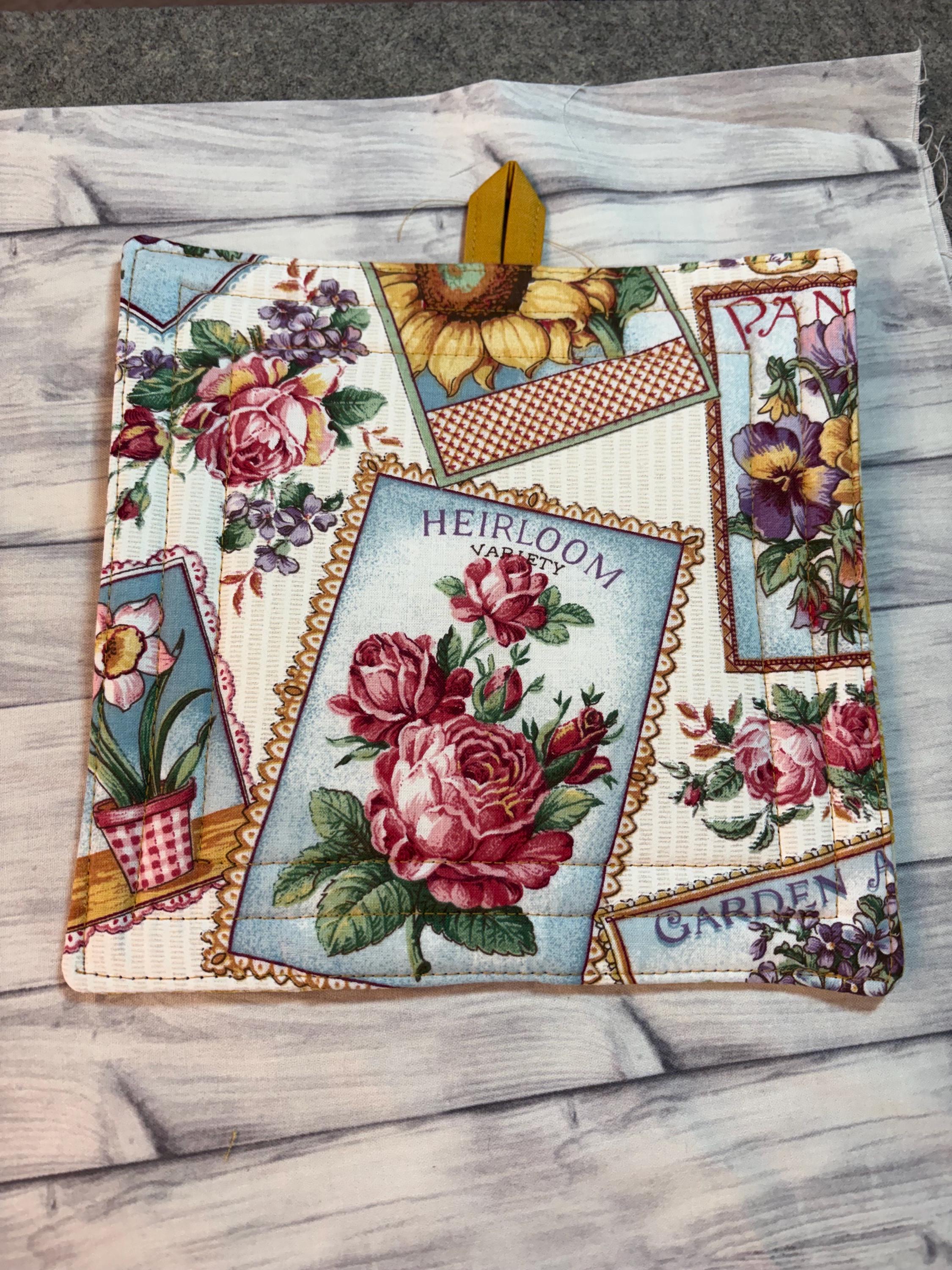 Pair of Vintage style seed pack label potholders, 8.25” homemade quilted view 2