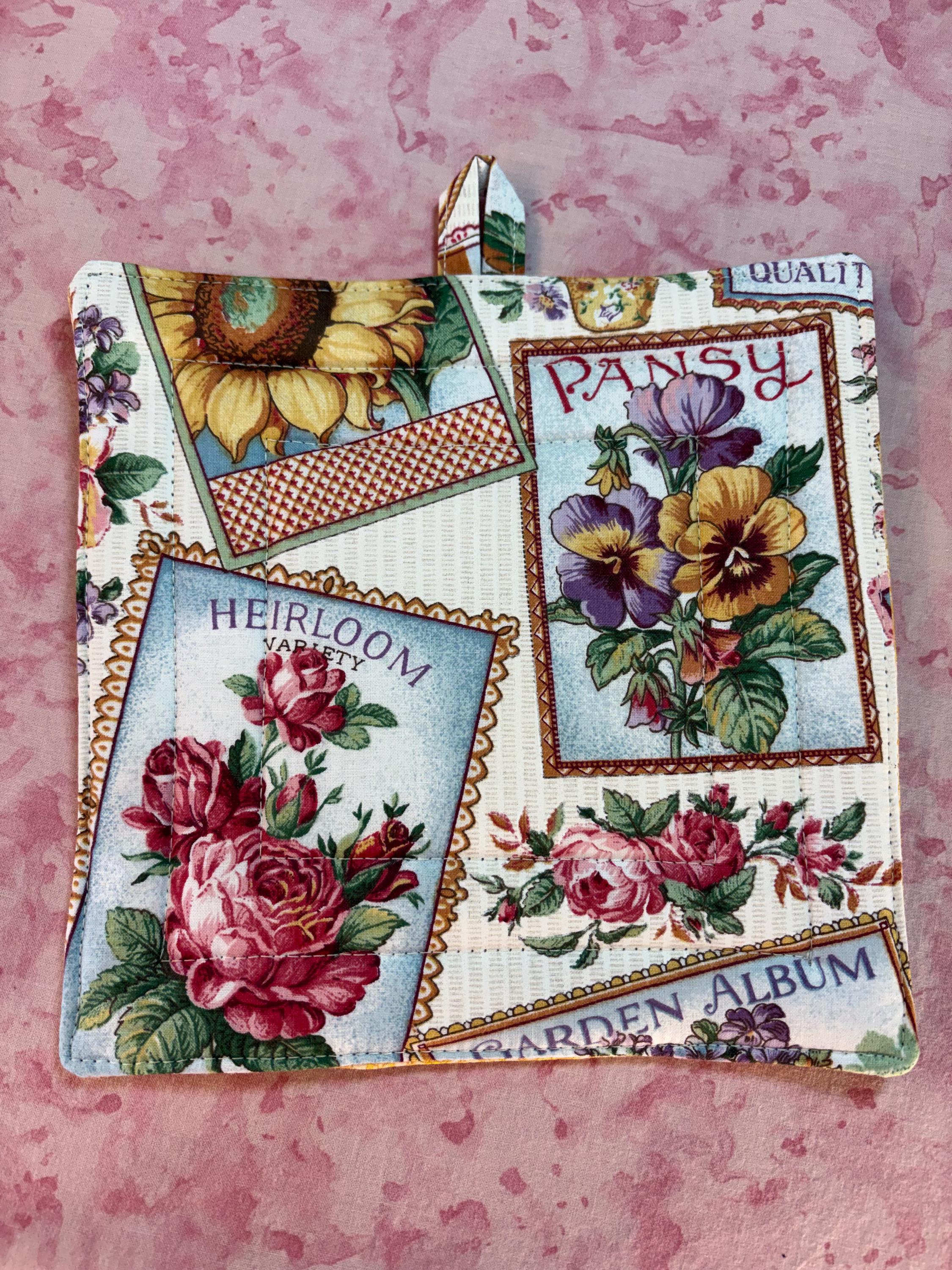 Pair of Vintage style seed pack label potholders, 8.25” homemade quilted view 6