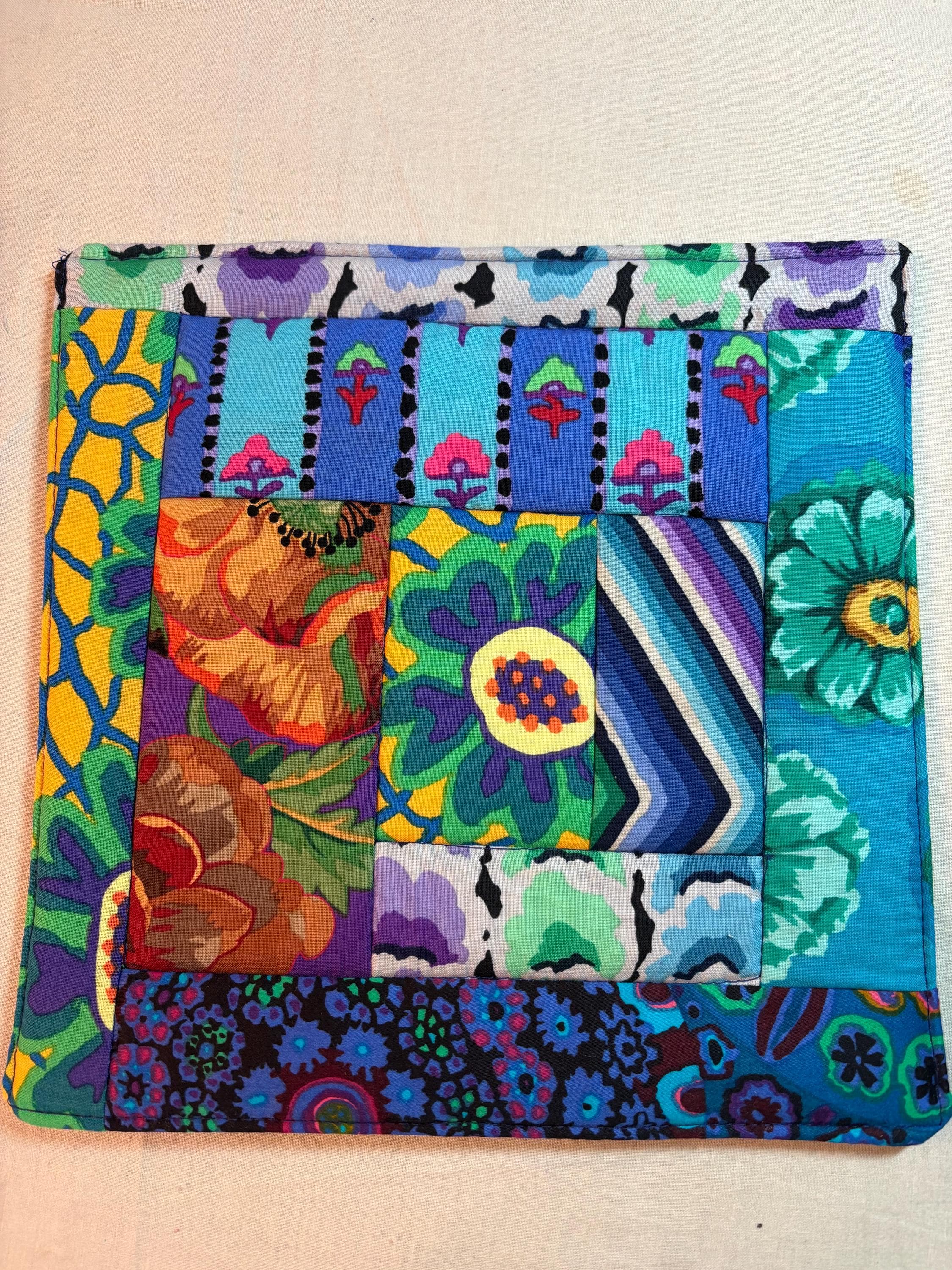 Single scrappy Kaffe potholder or mug rug homemade quilted