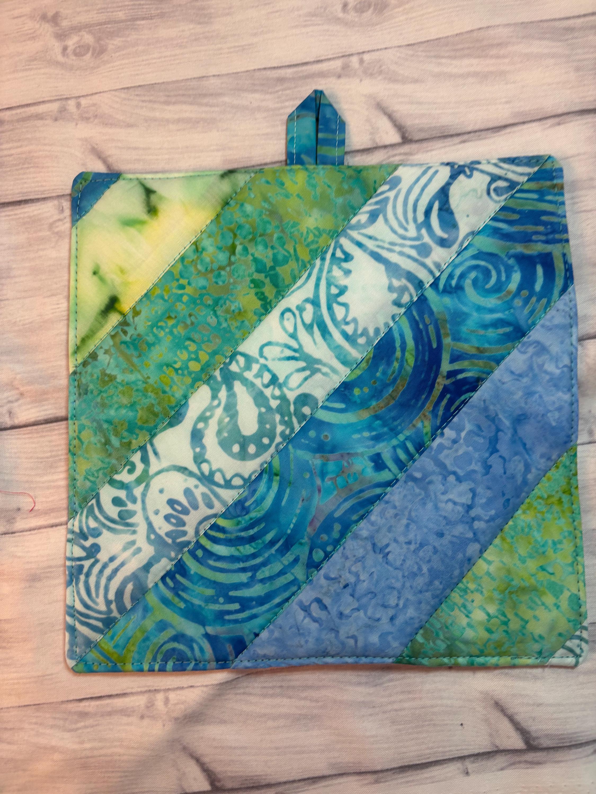 Pair of batik ocean blue potholders, 8” homemade quilted