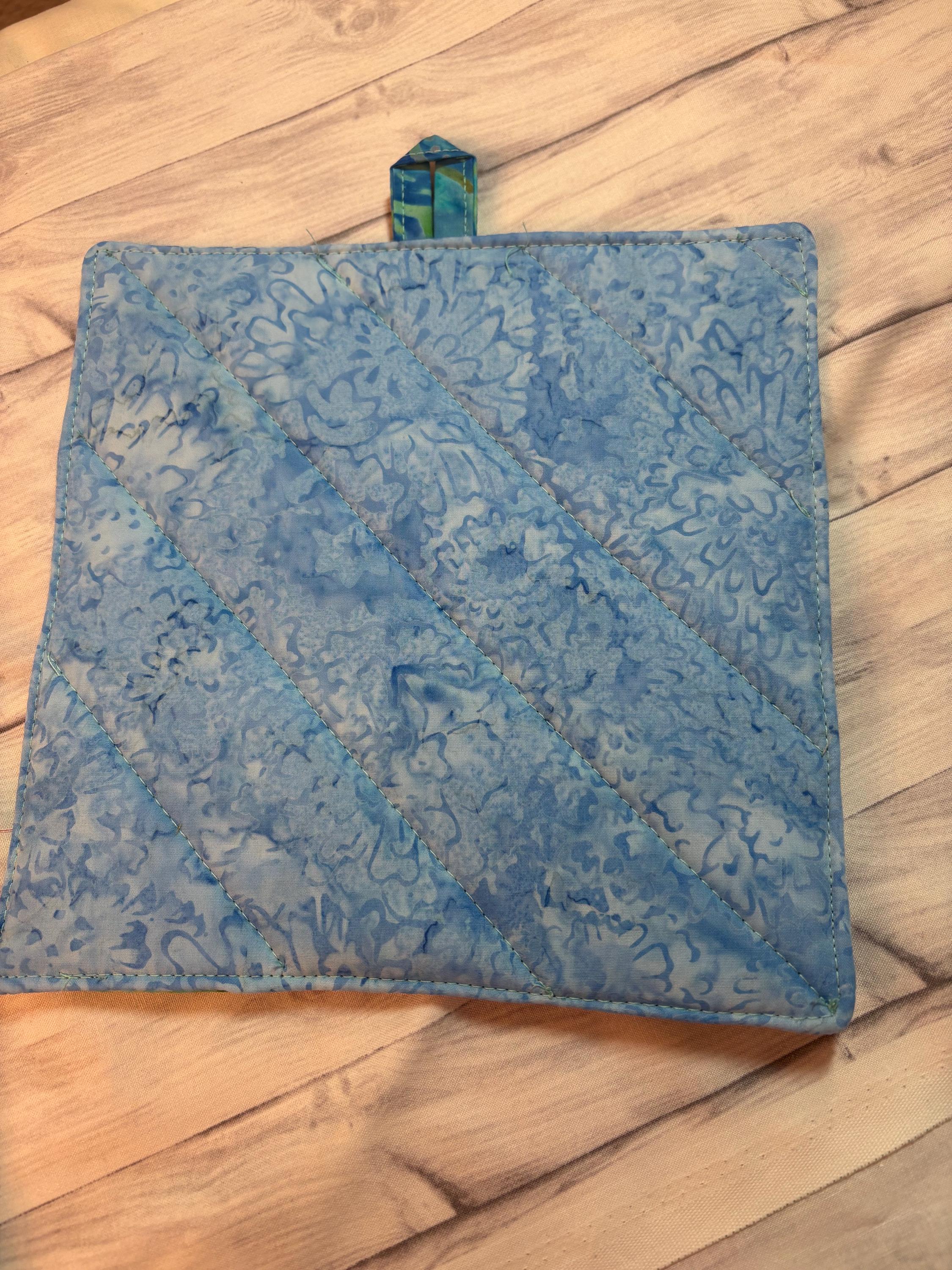 Pair of batik ocean blue potholders, 8” homemade quilted view 2