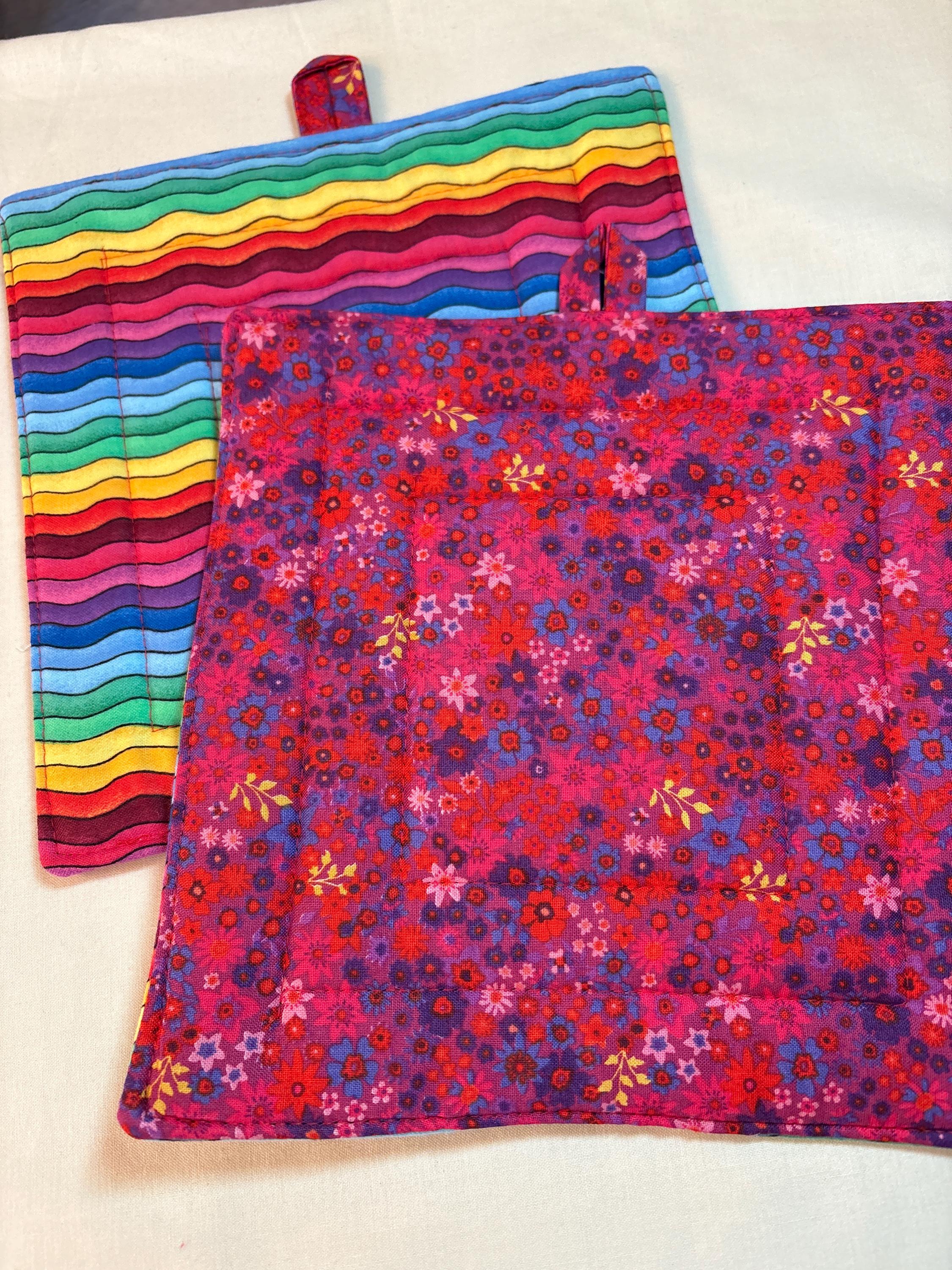 Pair of Rainbow bright potholders, 8” homemade quilted
