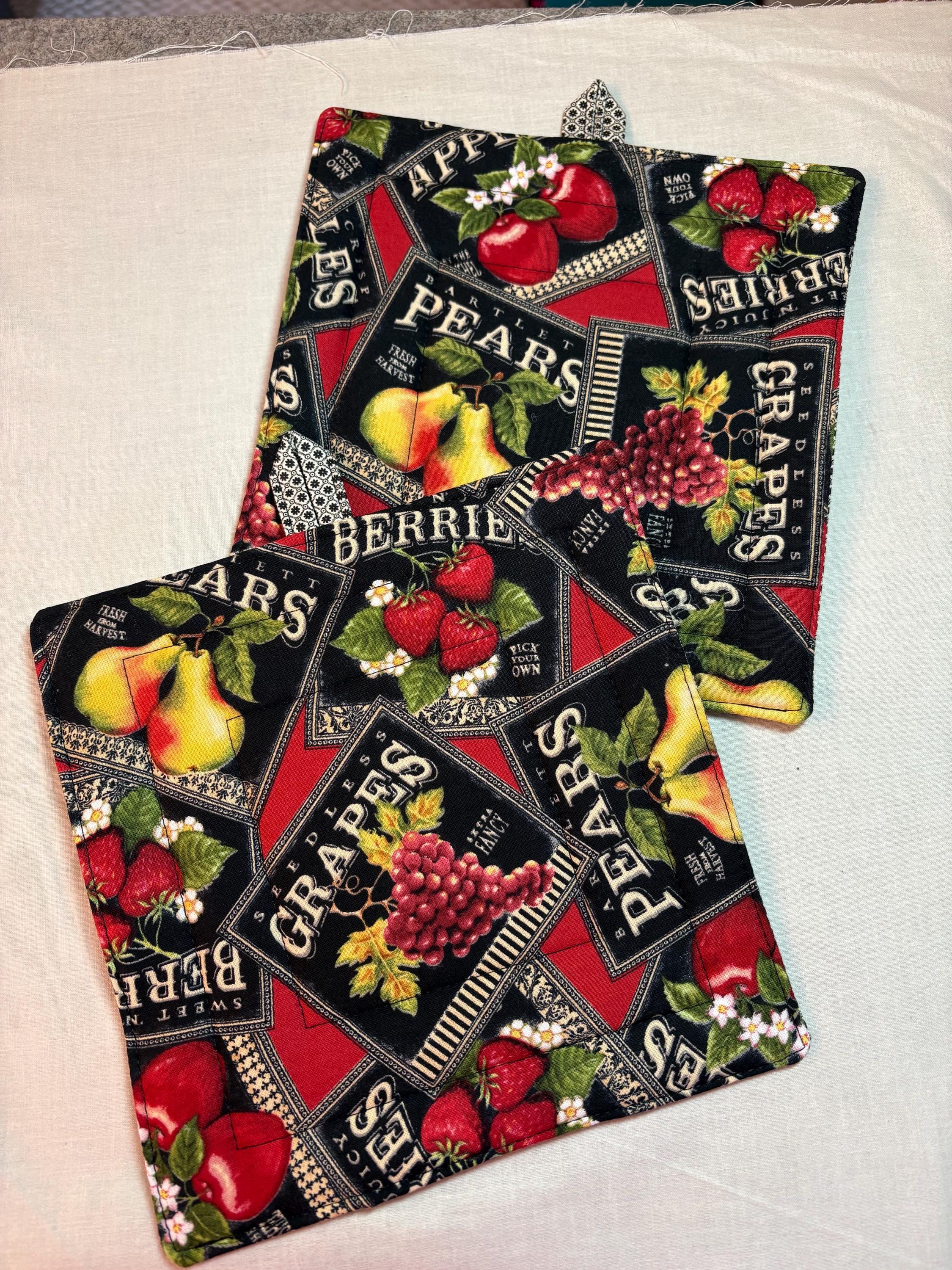 Pair of Vintage Fruit Label potholders, 8.25” homemade quilted