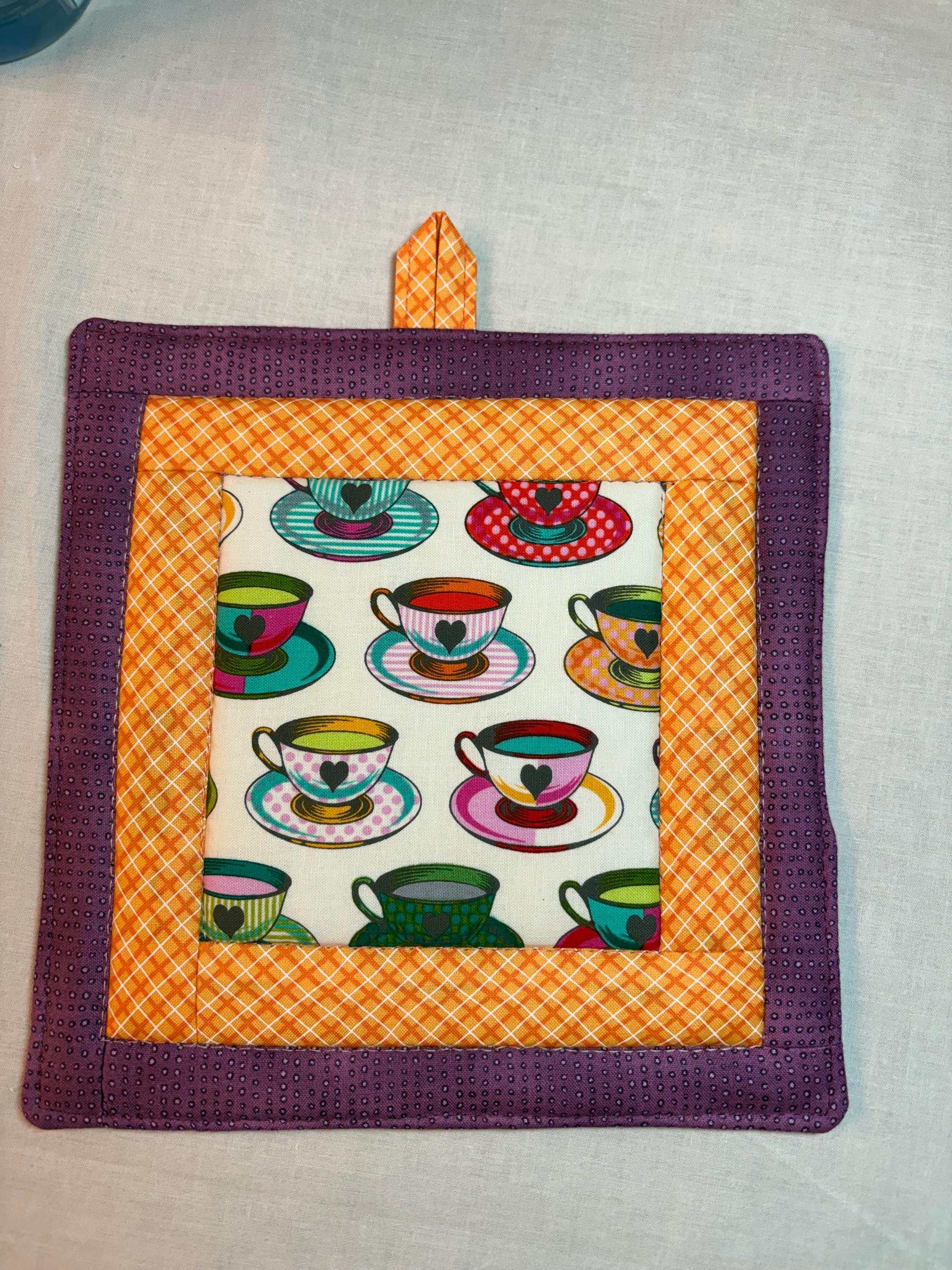 Single Tula Teacups potholder, 8” homemade quilted
