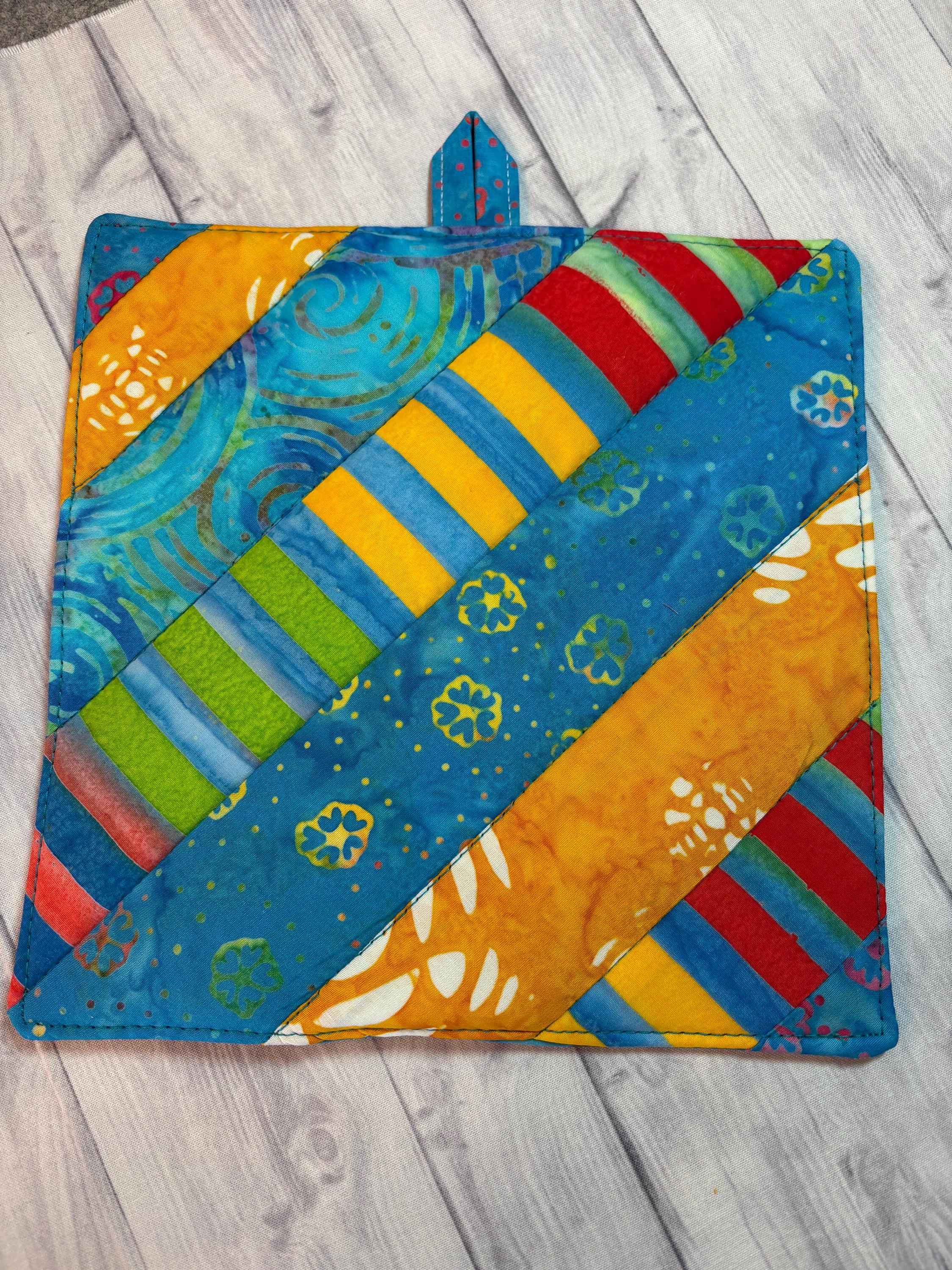 Pair of Rainbow Batik potholders, 8” homemade quilted view 3