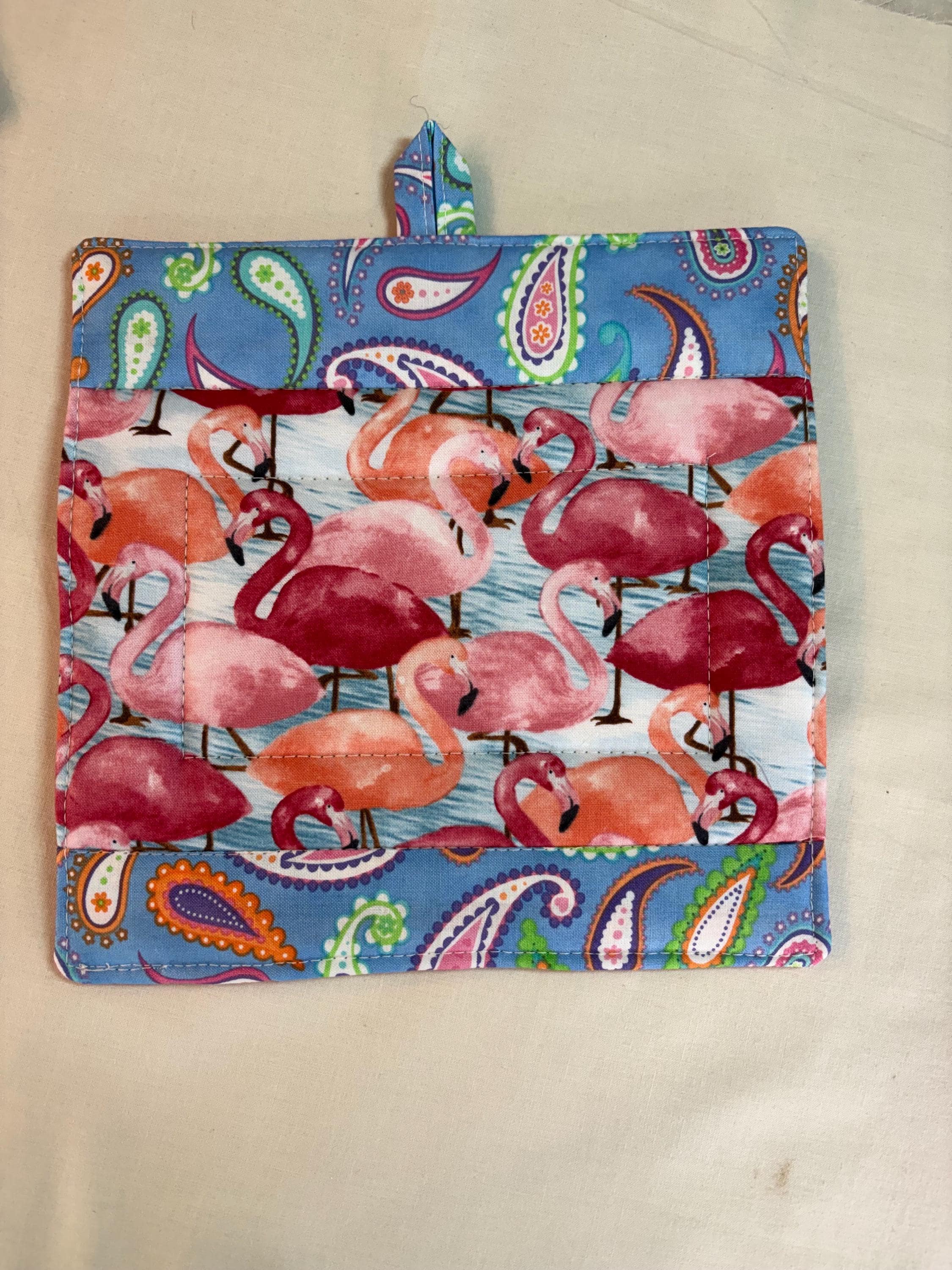 Single flamingo potholder, 8” homemade quilted