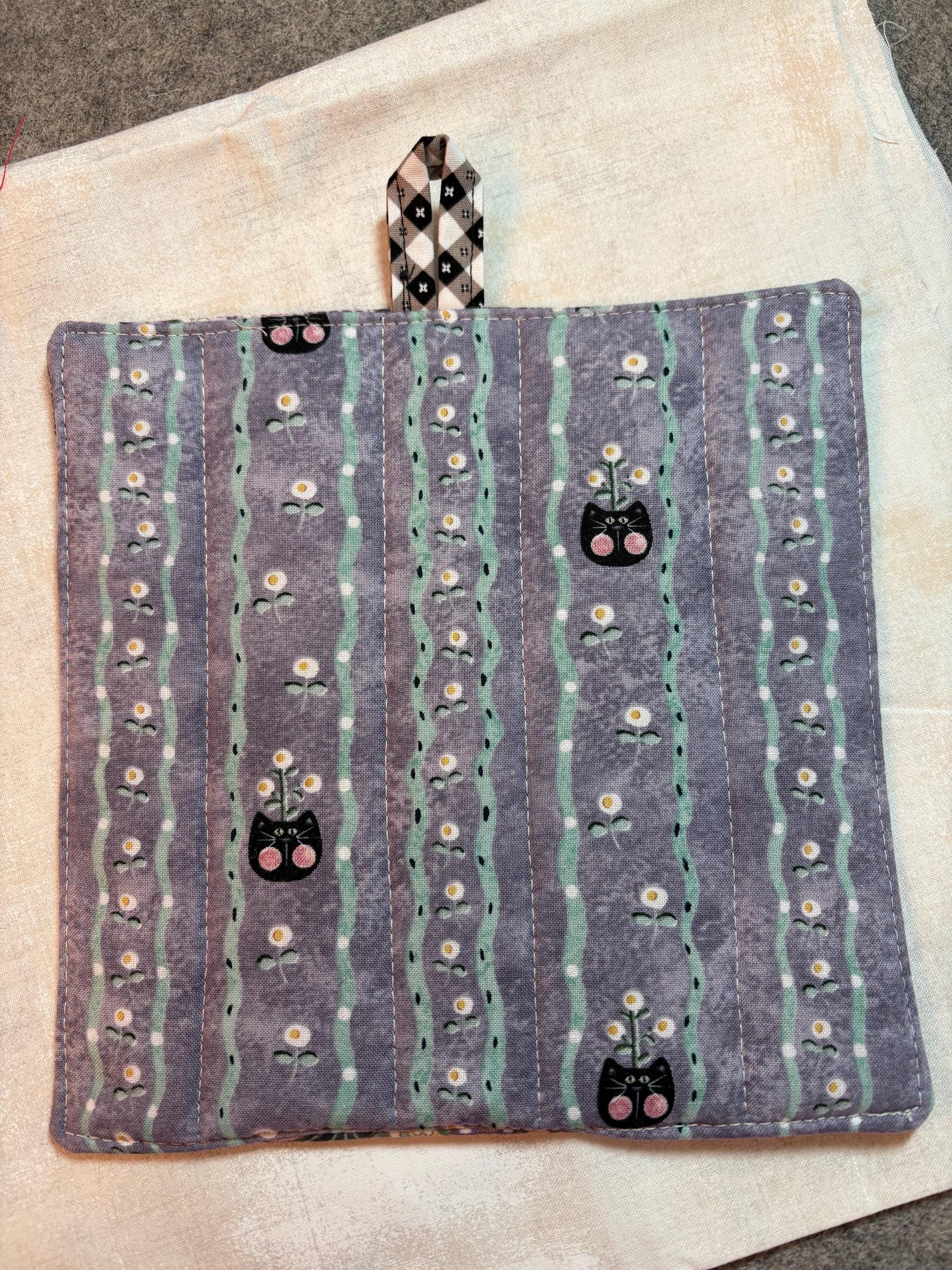 Single hummingbird potholder, 7.75” homemade quilted