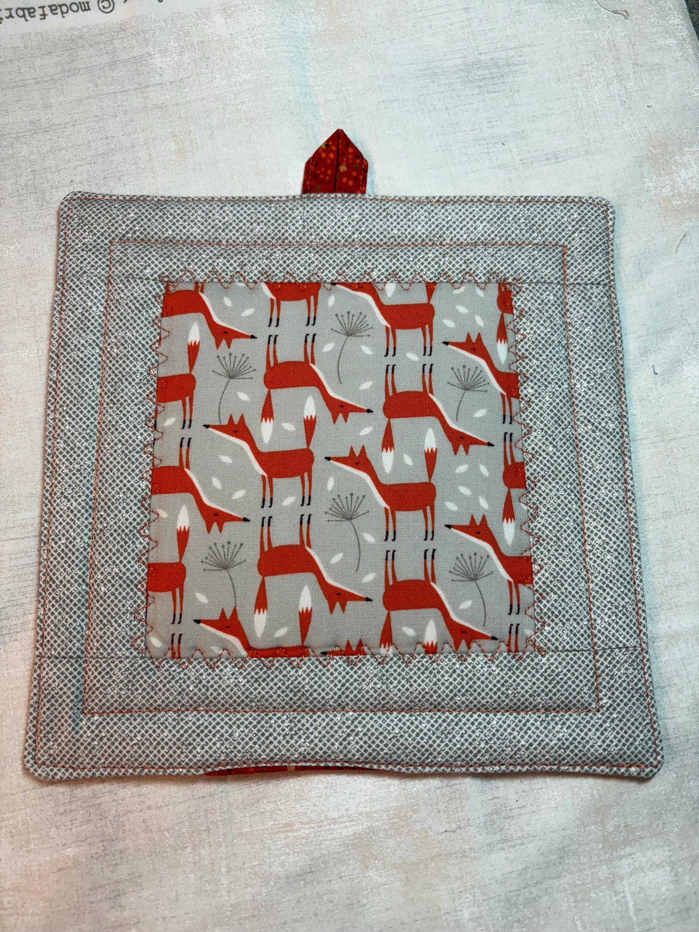 Single orange Fox potholder, 8” homemade quilted