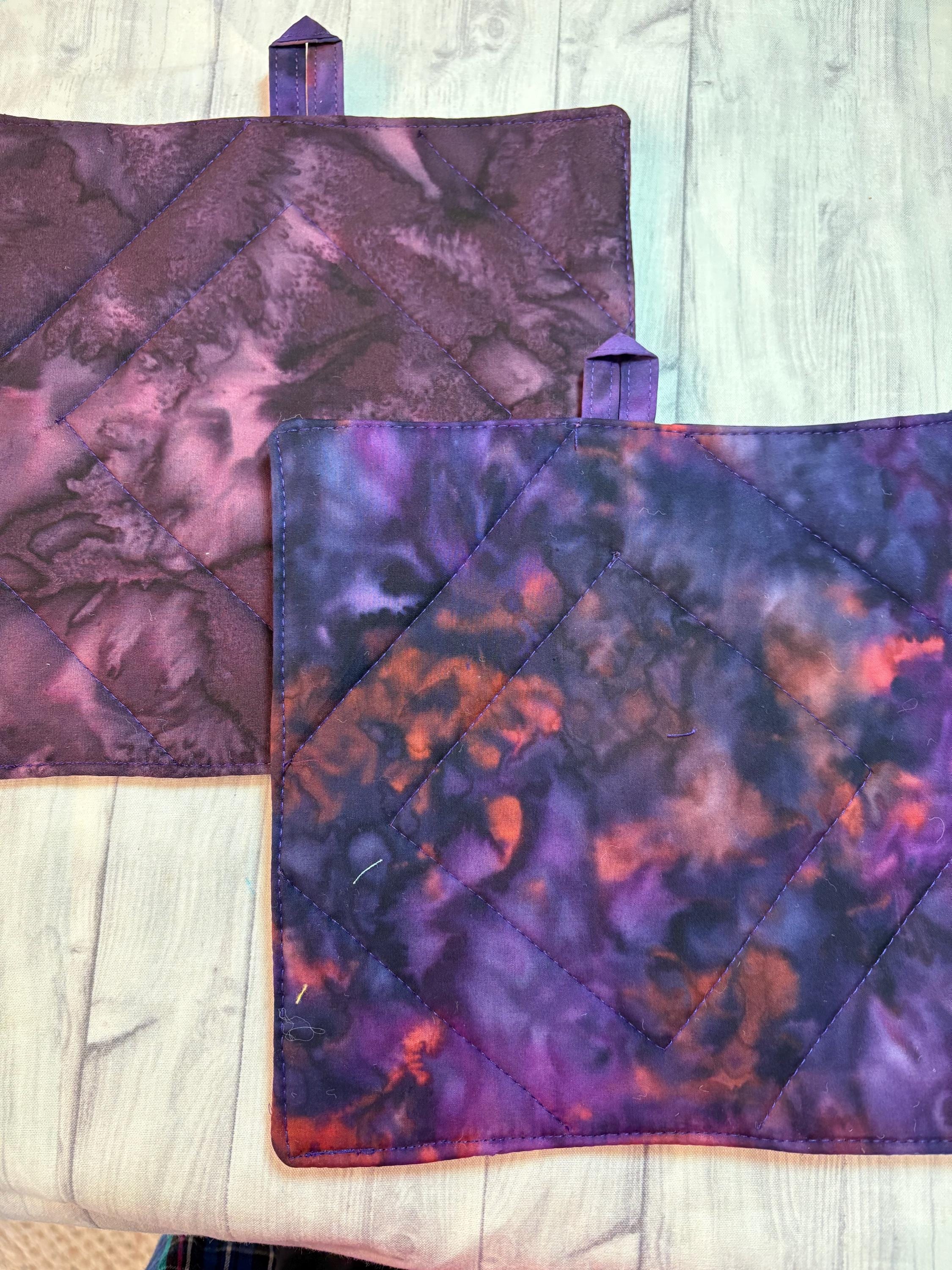 Pair of Scrappy purple Batik potholders rose center, 8” homemade quilted view 3