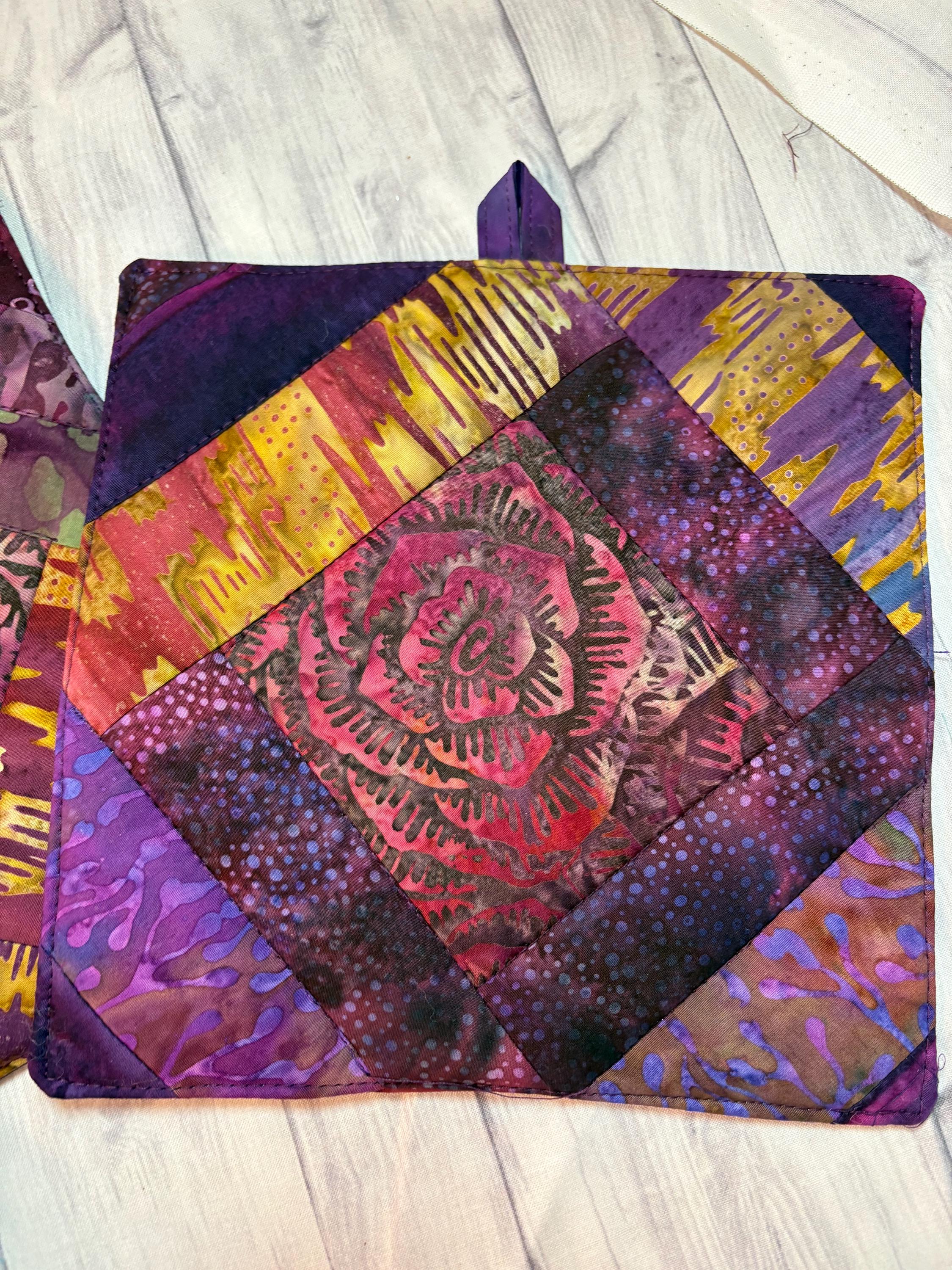 Pair of Scrappy purple Batik potholders rose center, 8” homemade quilted view 4