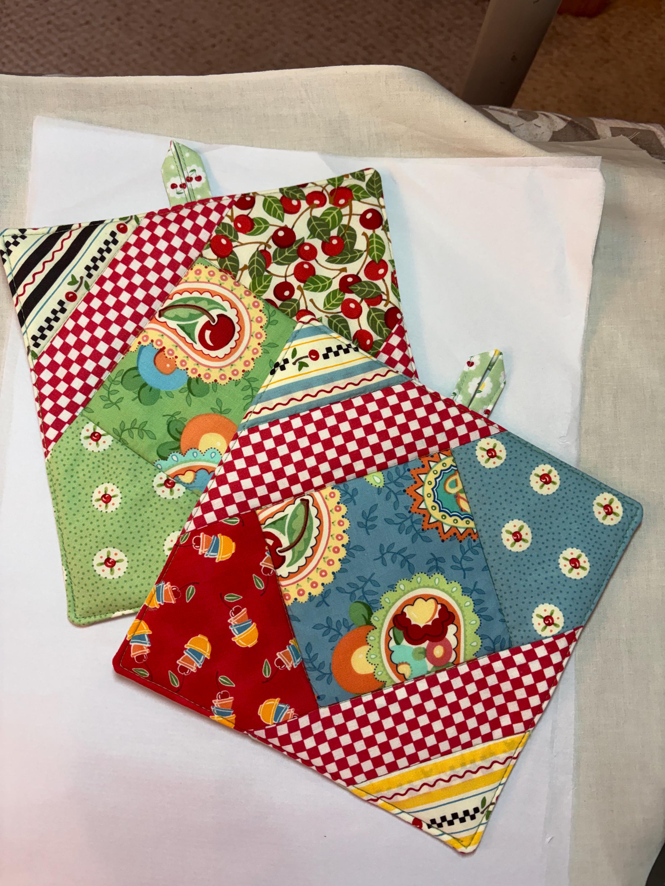 Pair (2) Mary Engelbreit potholders, 8” homemade quilted