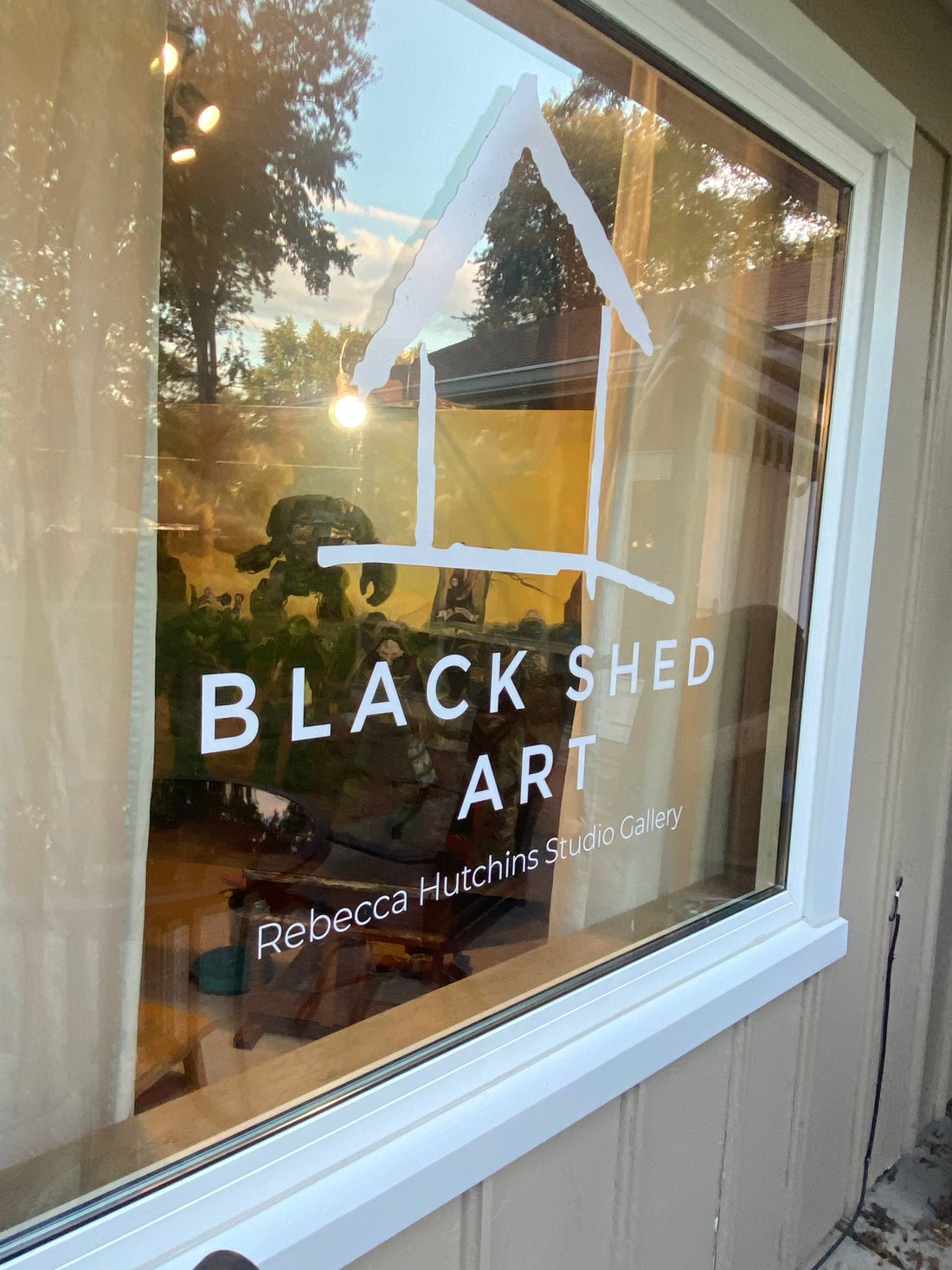 Black Shed Art window sign at Rebecca Hutchins Studio Gallery