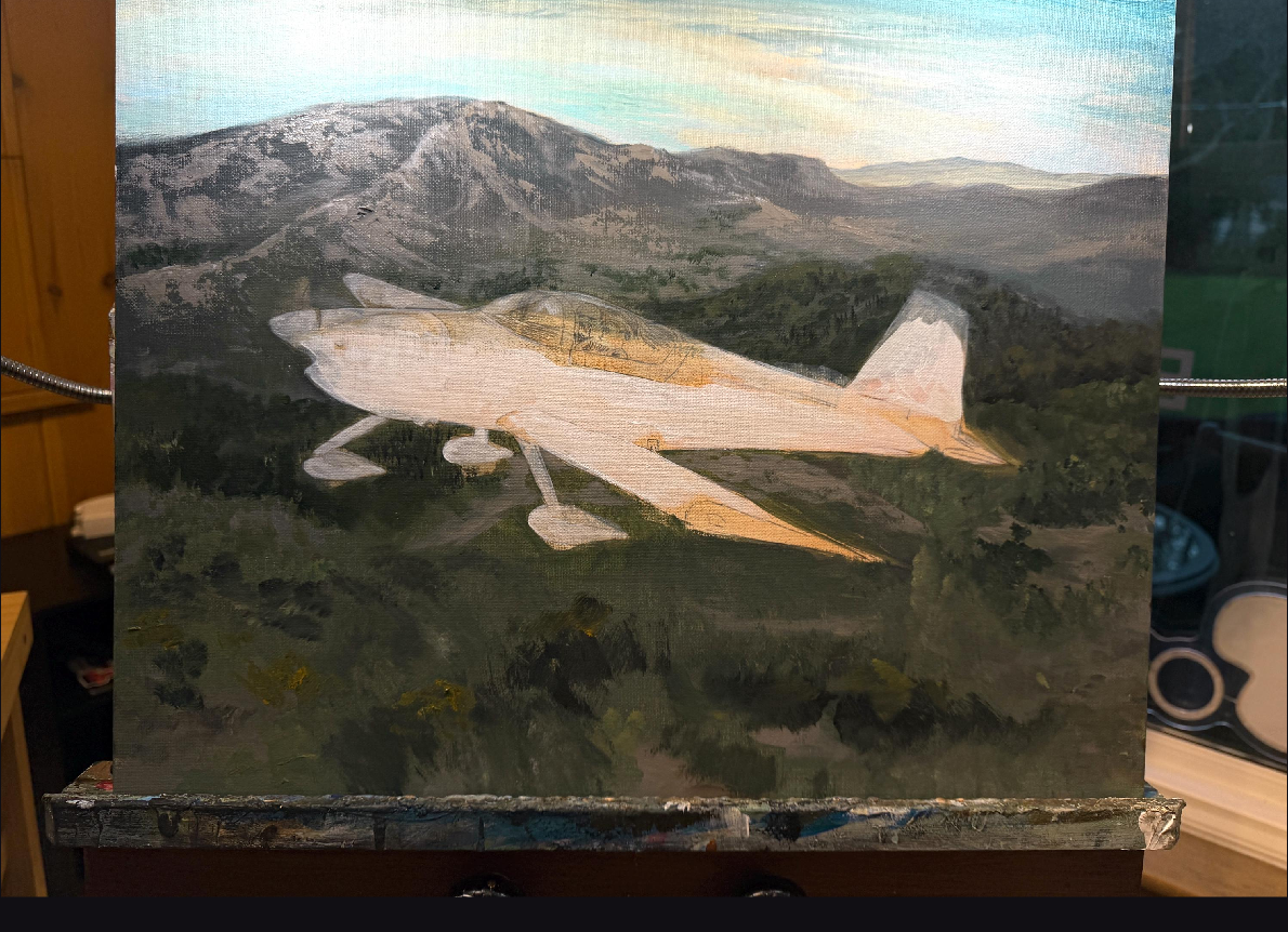 A work-in-progress airplane painting viewed on a phone