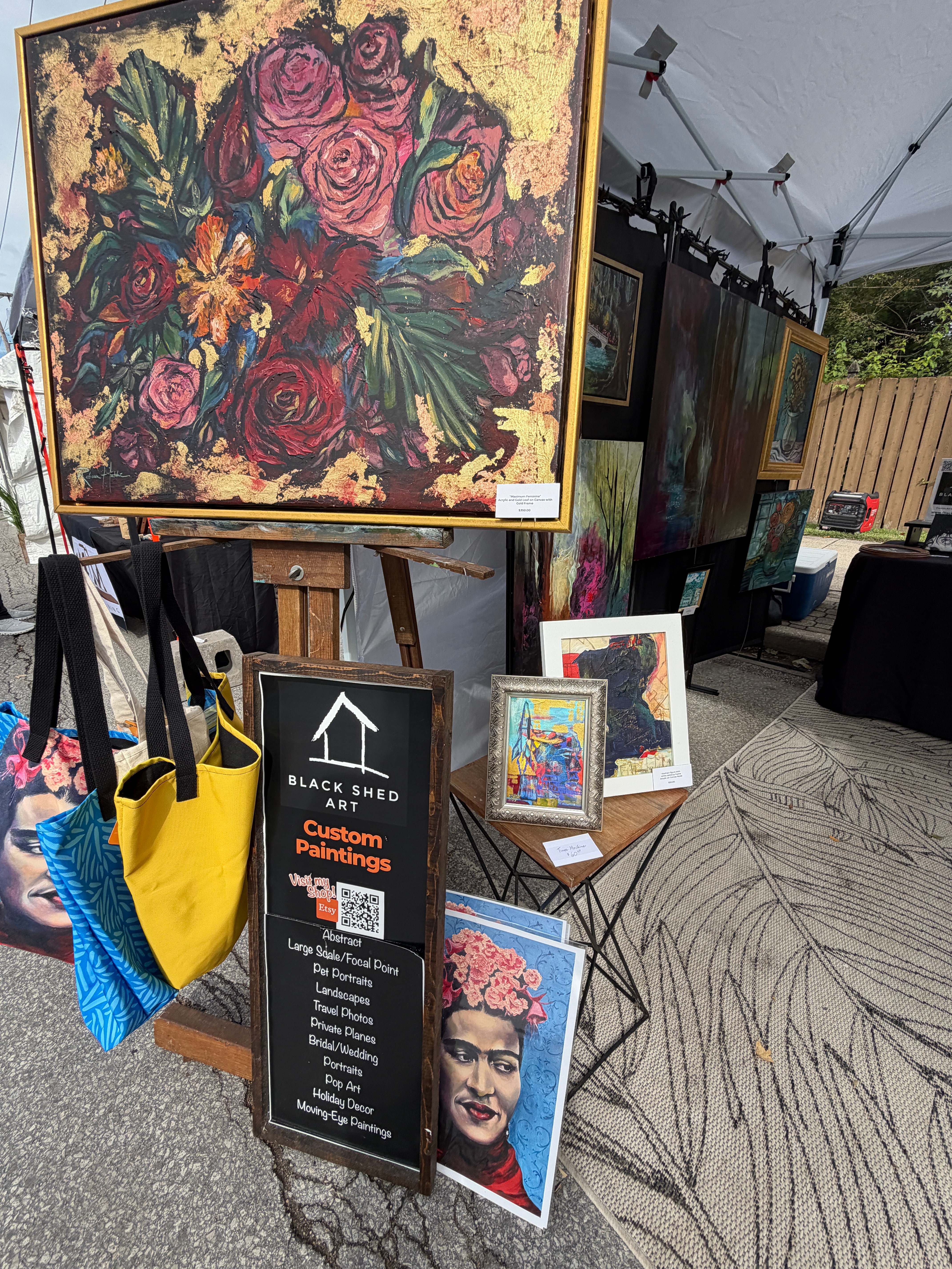 Floral painting displayed at the Black Shed Art booth