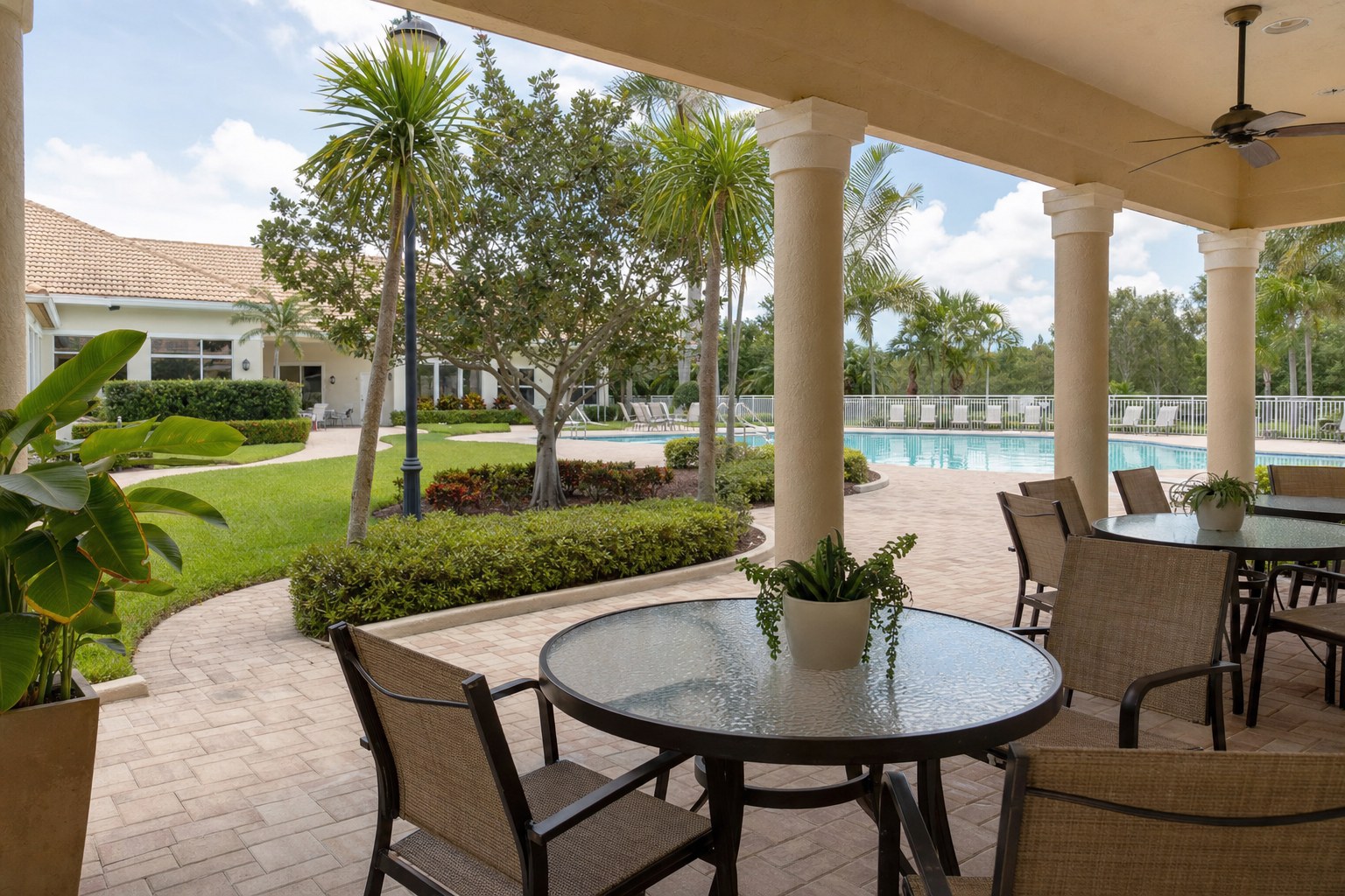 Covered patio and pool area at a South Florida active-adult community clubhouse