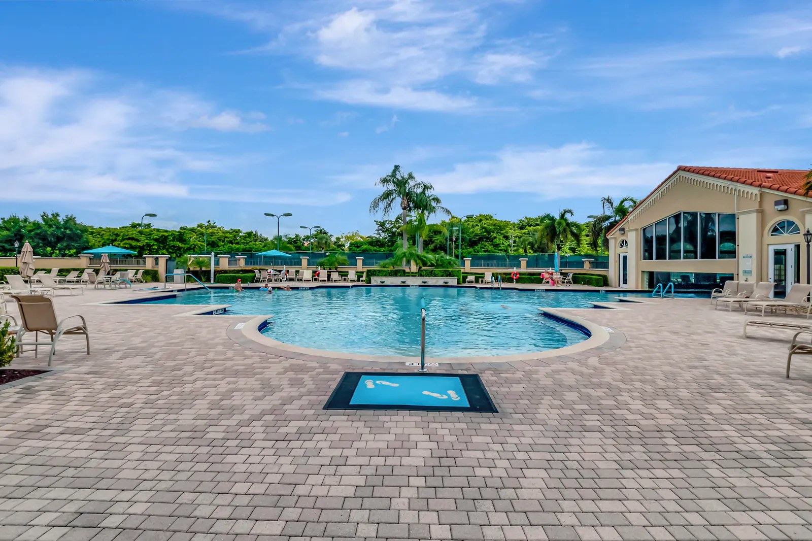 Outdoor pool area in a South Florida active-adult community
