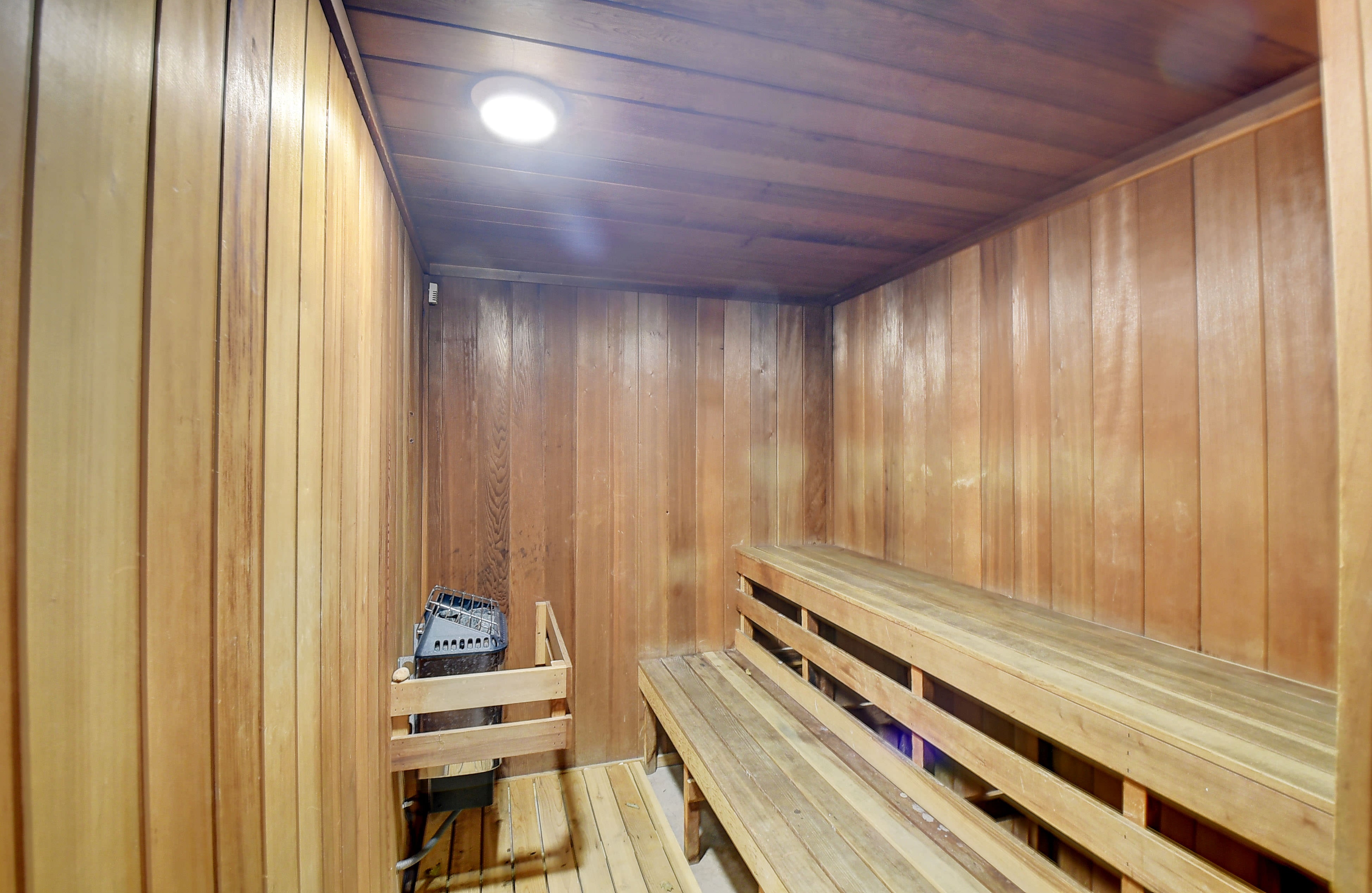 Abbey Village sauna with wood benches