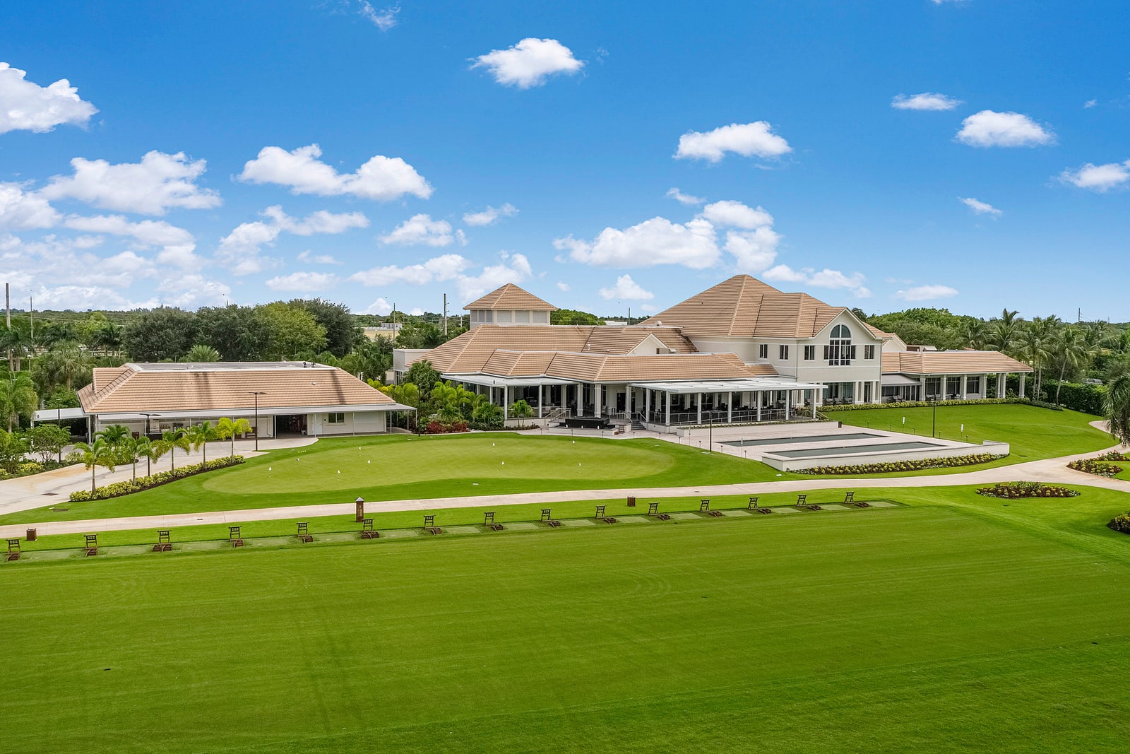 Aerial view of Aberdeen Country Club, its clubhouse and golf course in Boynton Beach