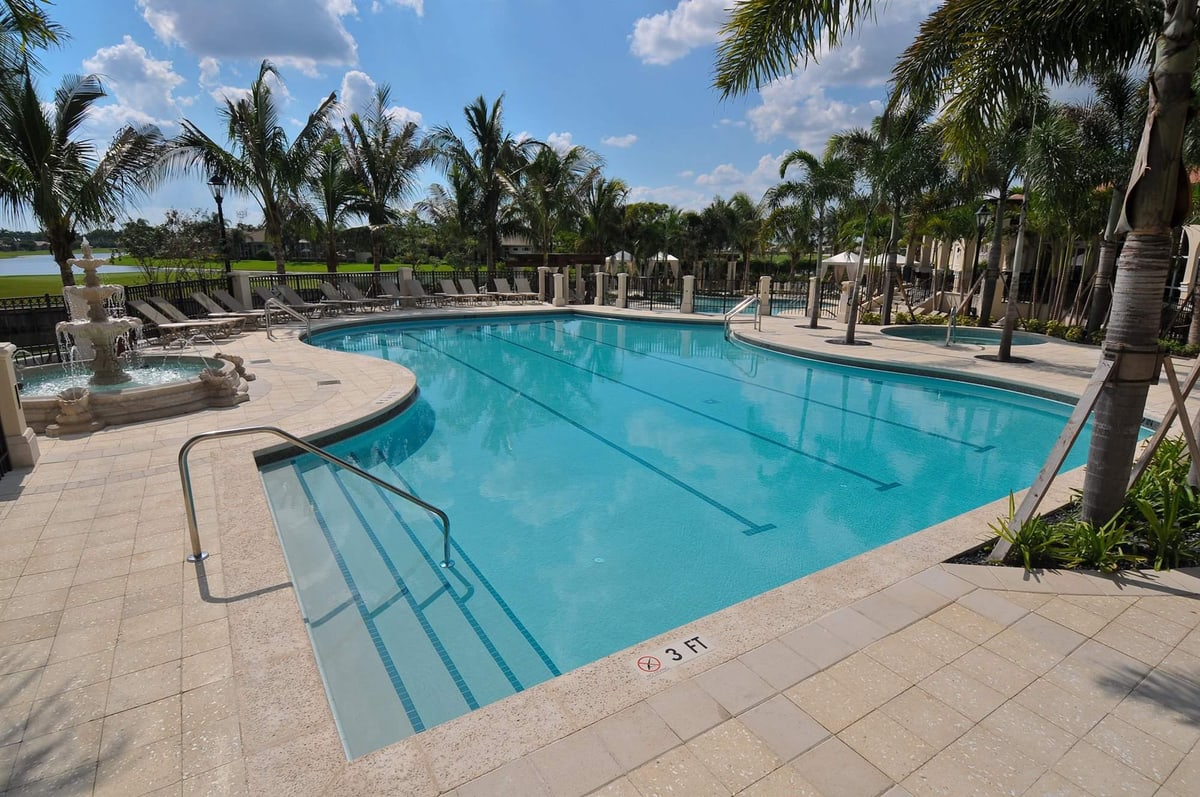 Aberdeen Country Club lap pool with palm trees