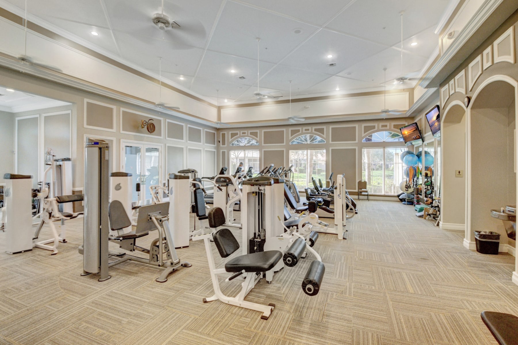 Avalon Estates fitness center with cardio and strength-training equipment