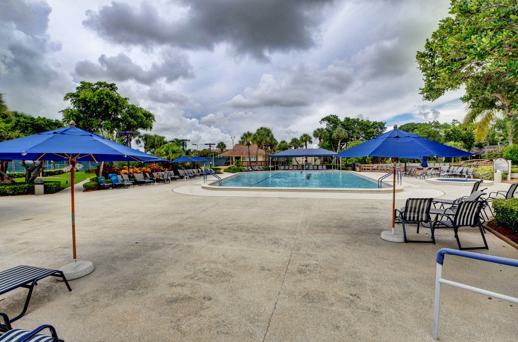 Outdoor pool and lounge area at Banyan Springs