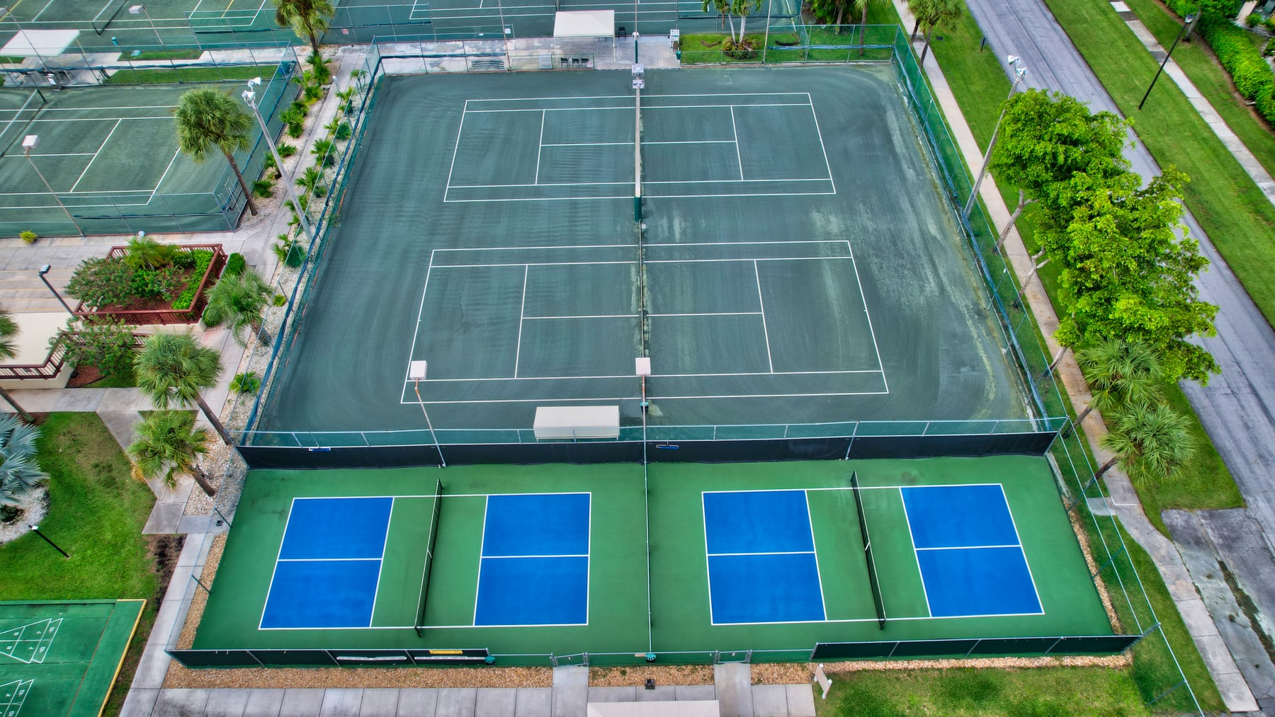 Aerial view of tennis and pickleball courts at Banyan Springs