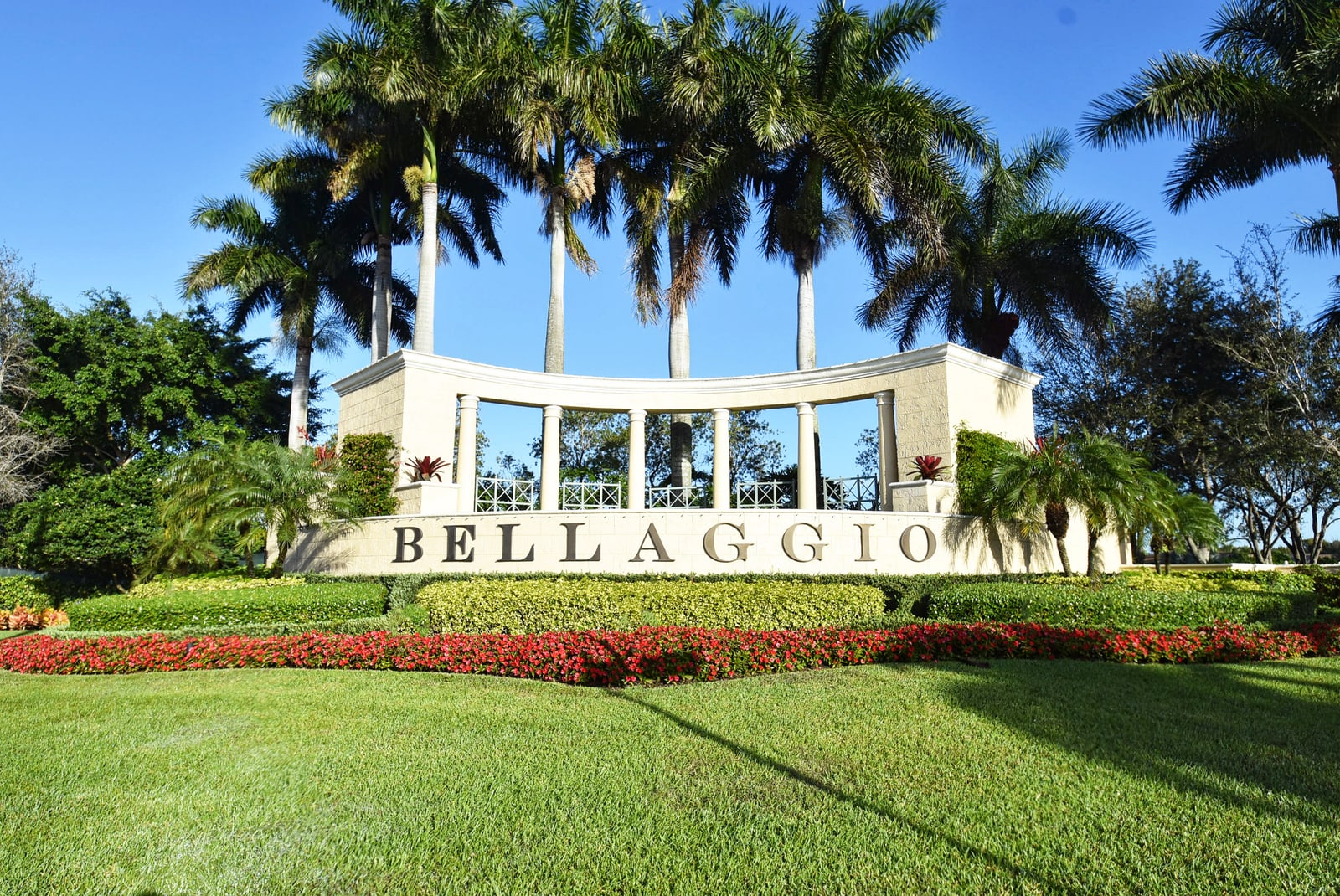 Bellaggio community sign and palm-lined entrance in Lake Worth