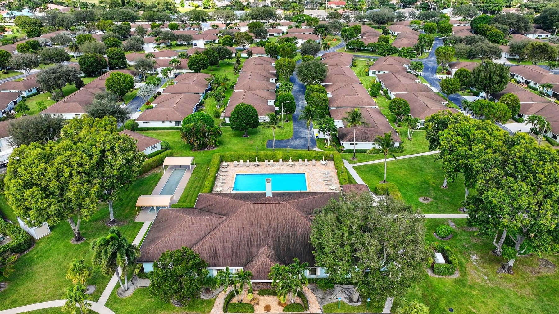 Aerial view of Bent Tree Villas East clubhouse and pool in Boynton Beach