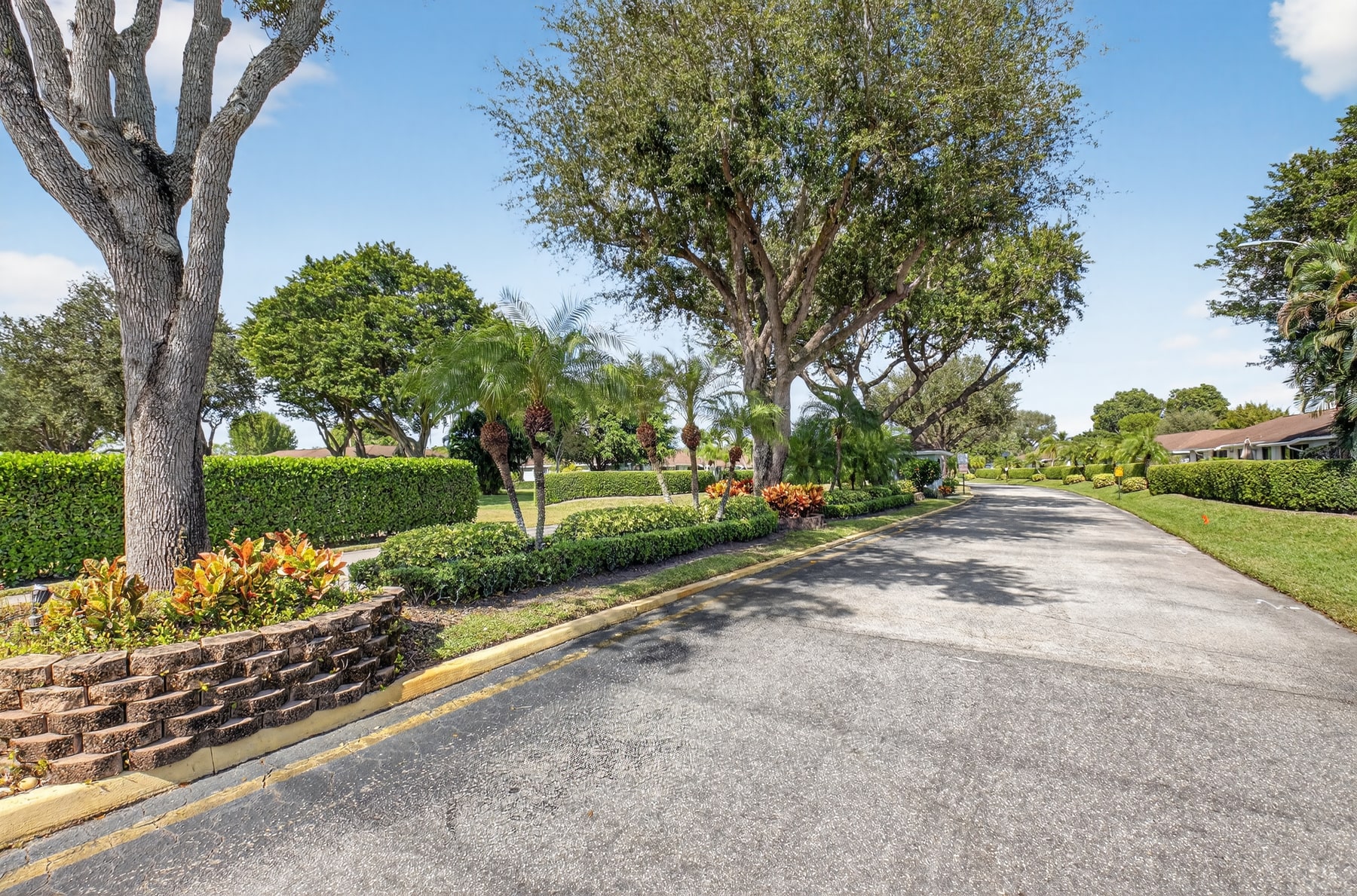 Landscaped entry drive at Bent Tree Villas East