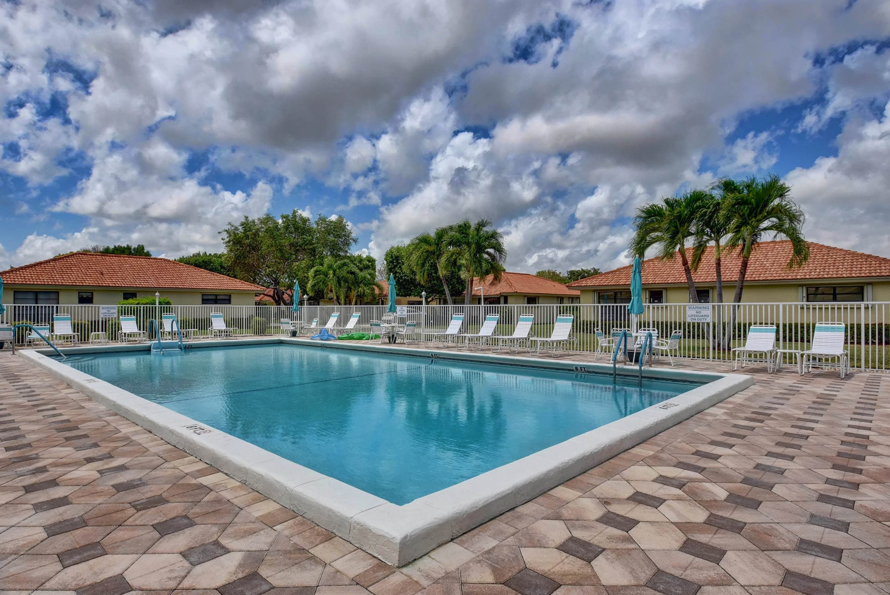 Outdoor pool at Bent Tree Villas West in Boynton Beach
