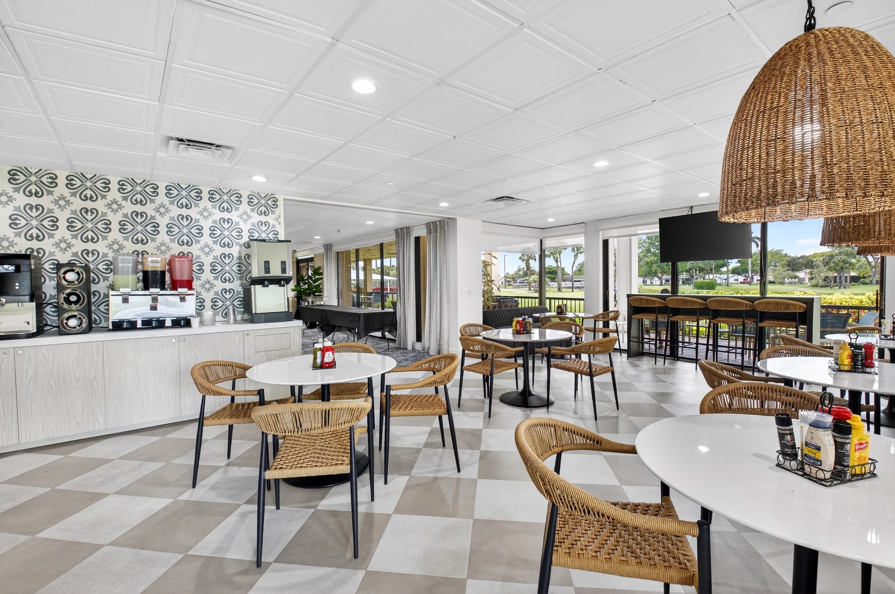 Café seating inside the Boca Delray clubhouse