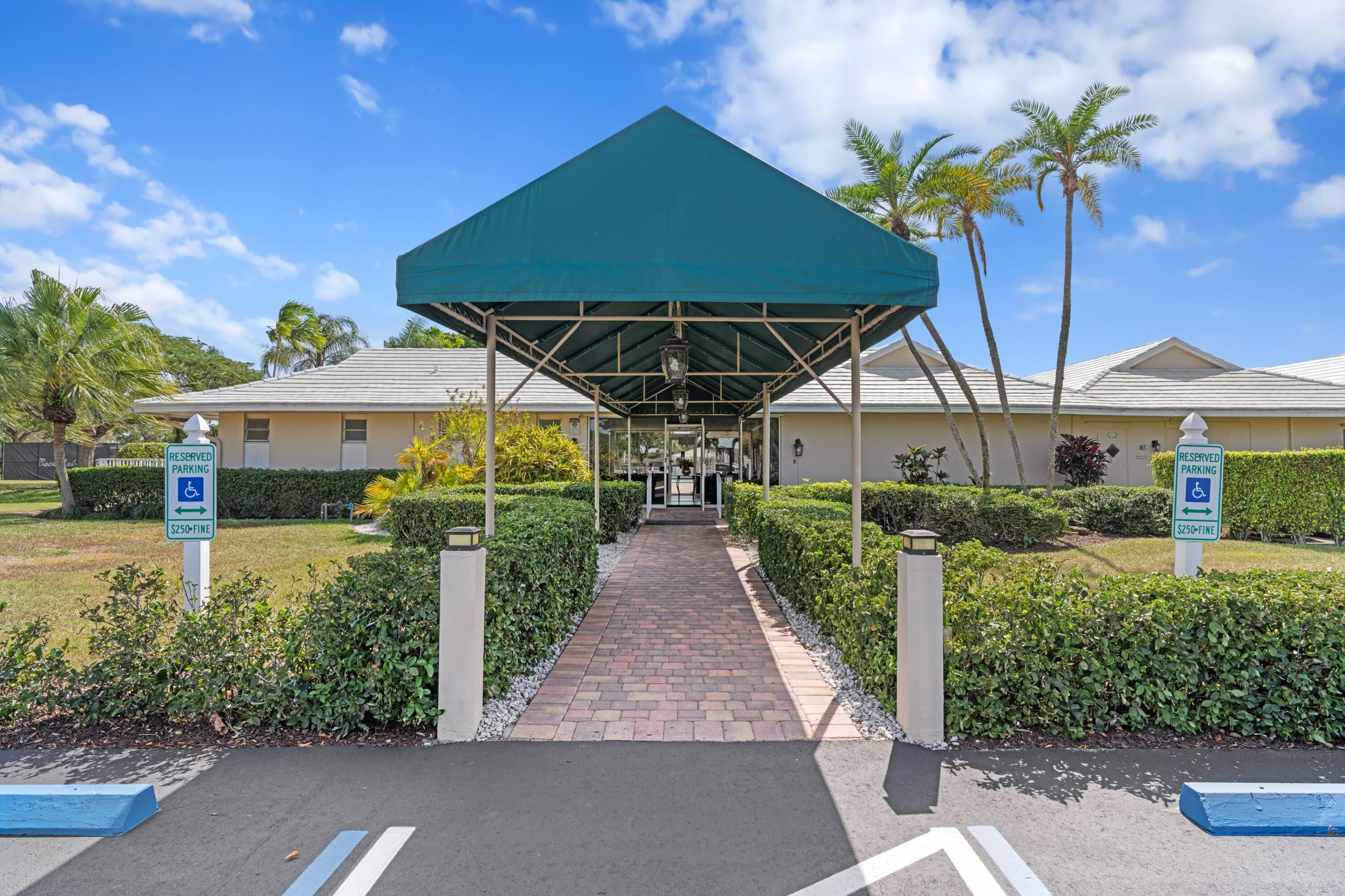 Covered Boca Lakes clubhouse entrance