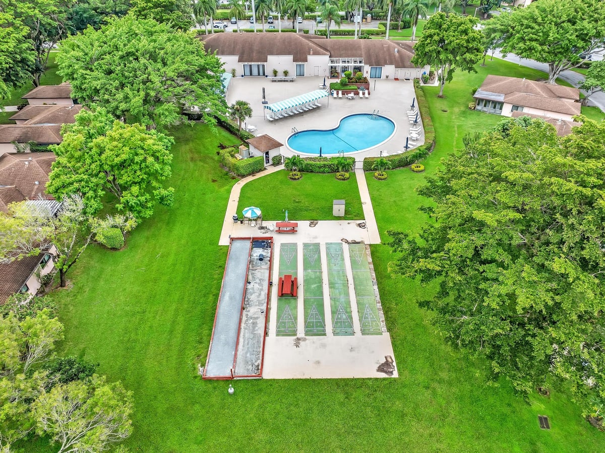 Aerial view of Bonaire Village pool and clubhouse