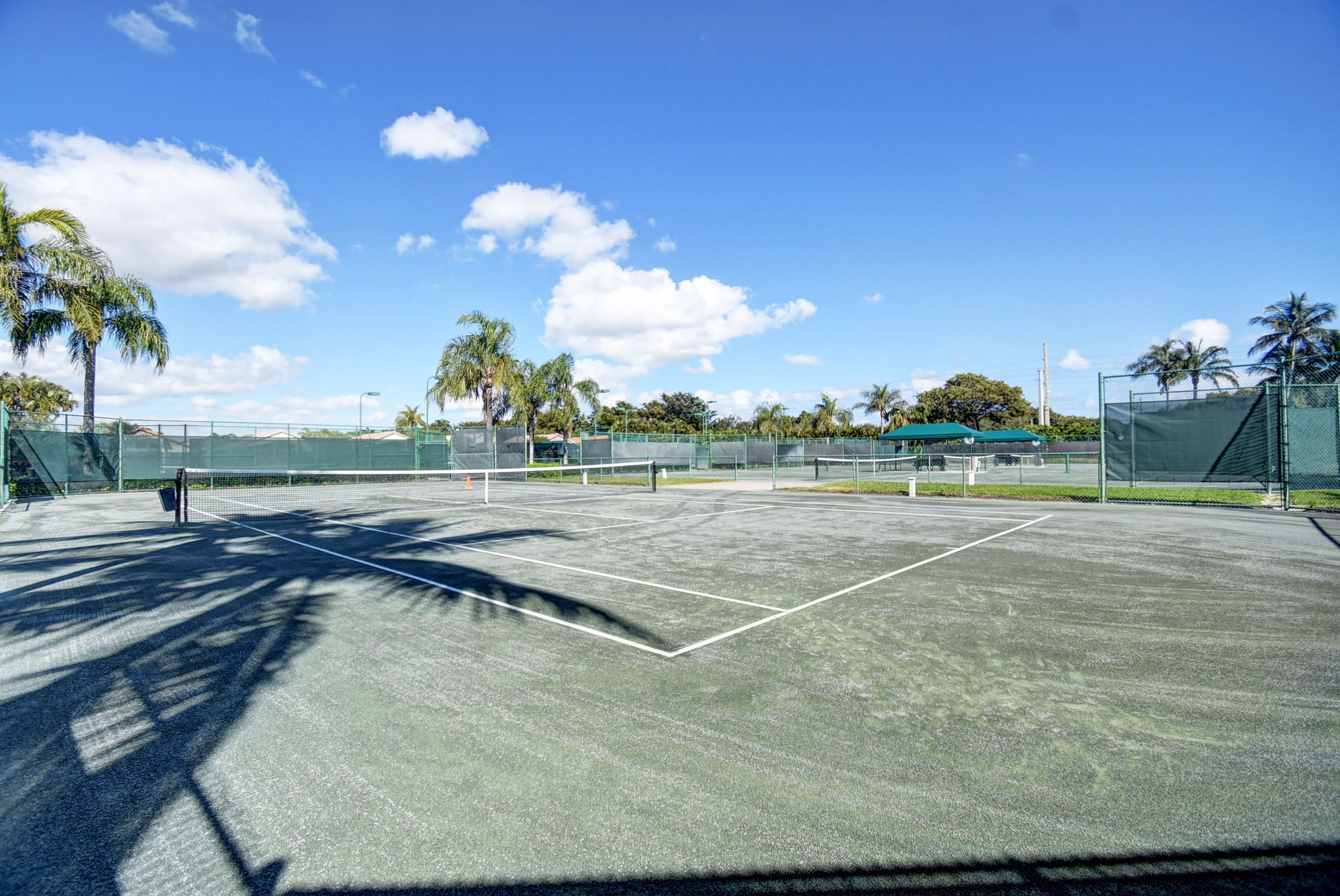 Tennis courts at The Cascades active-adult community in Boynton Beach