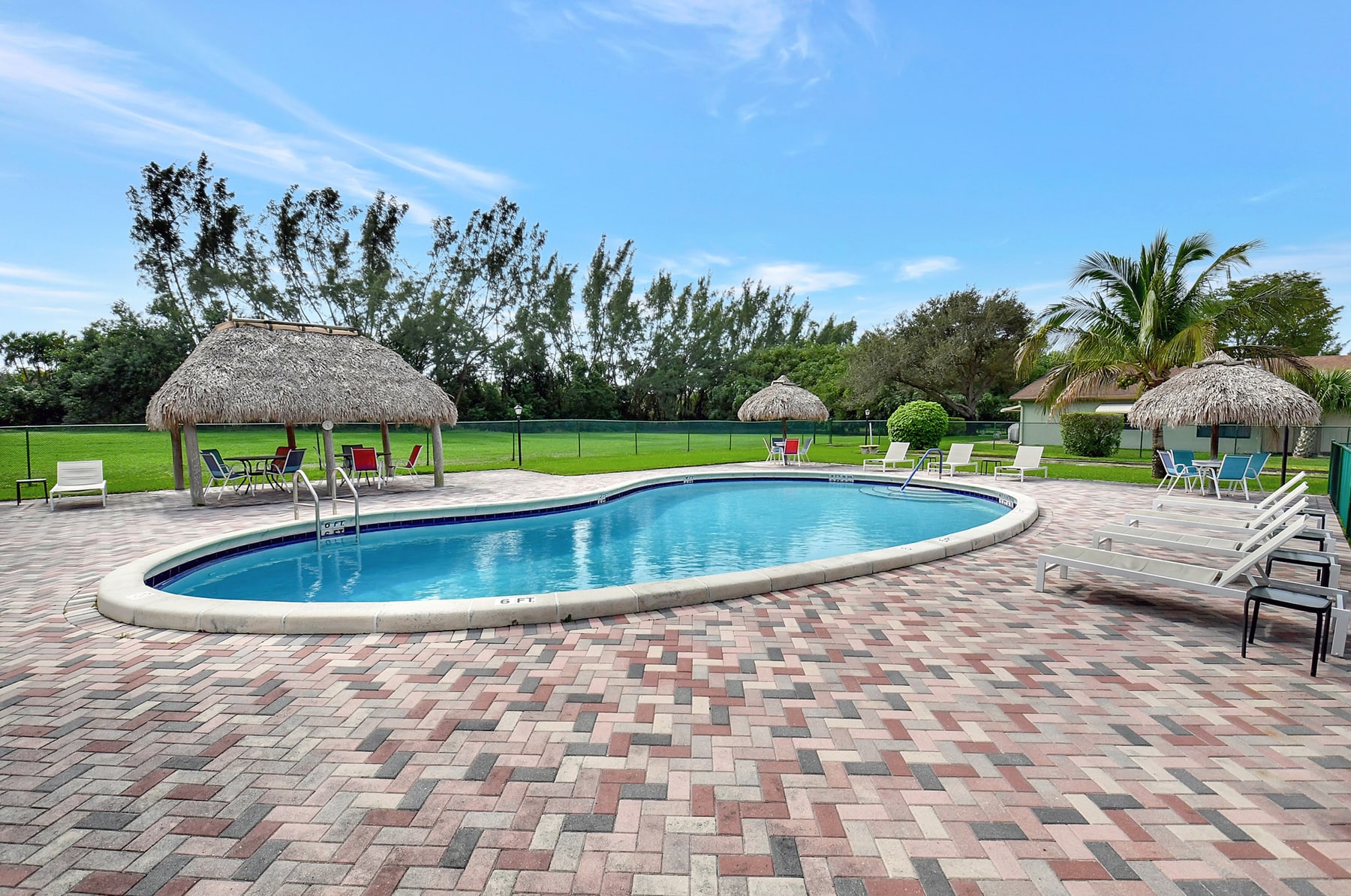 Poolside seating at Chanteclair Villas