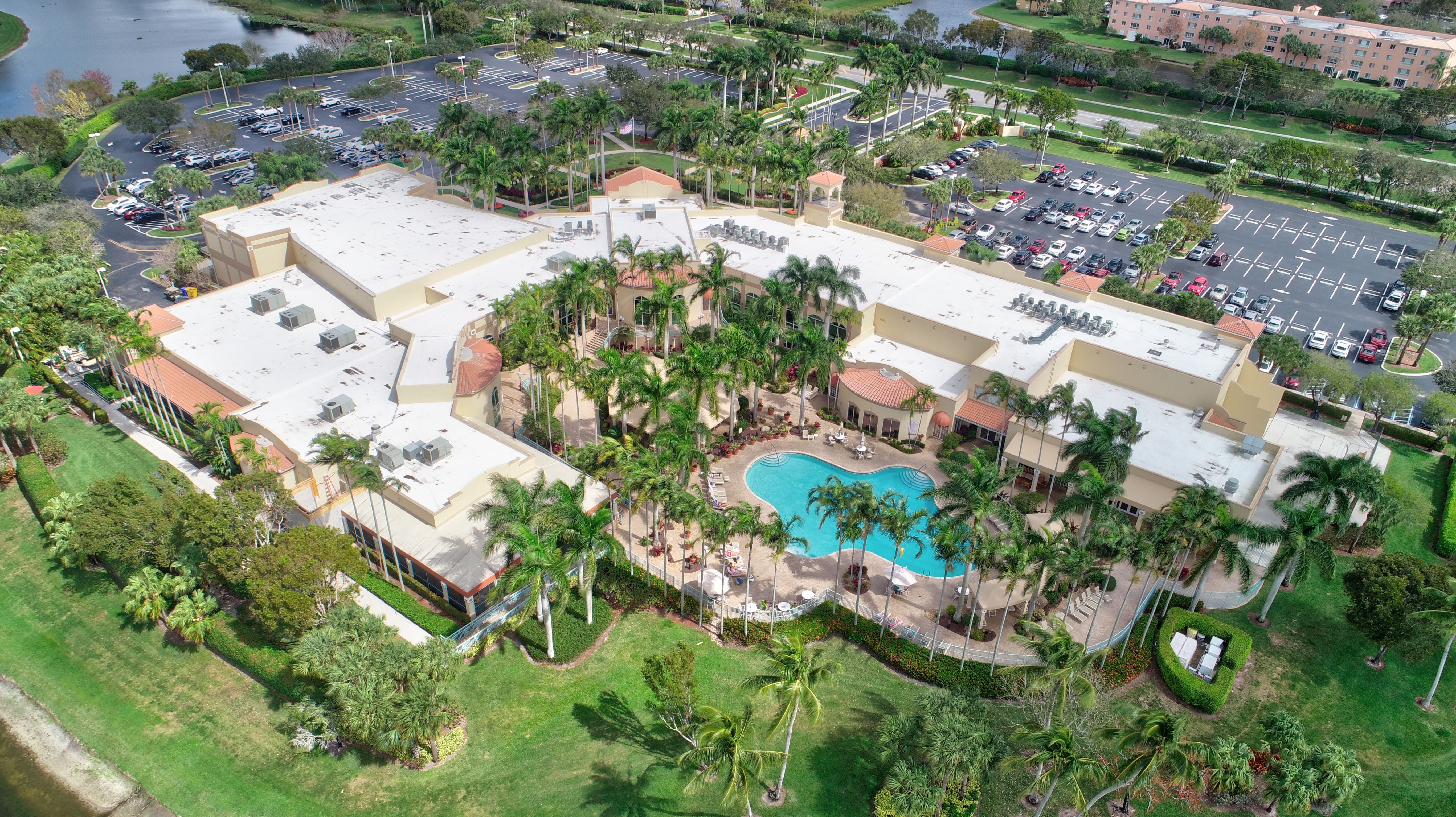 Aerial view of the Coral Lakes clubhouse and pool in Boynton Beach