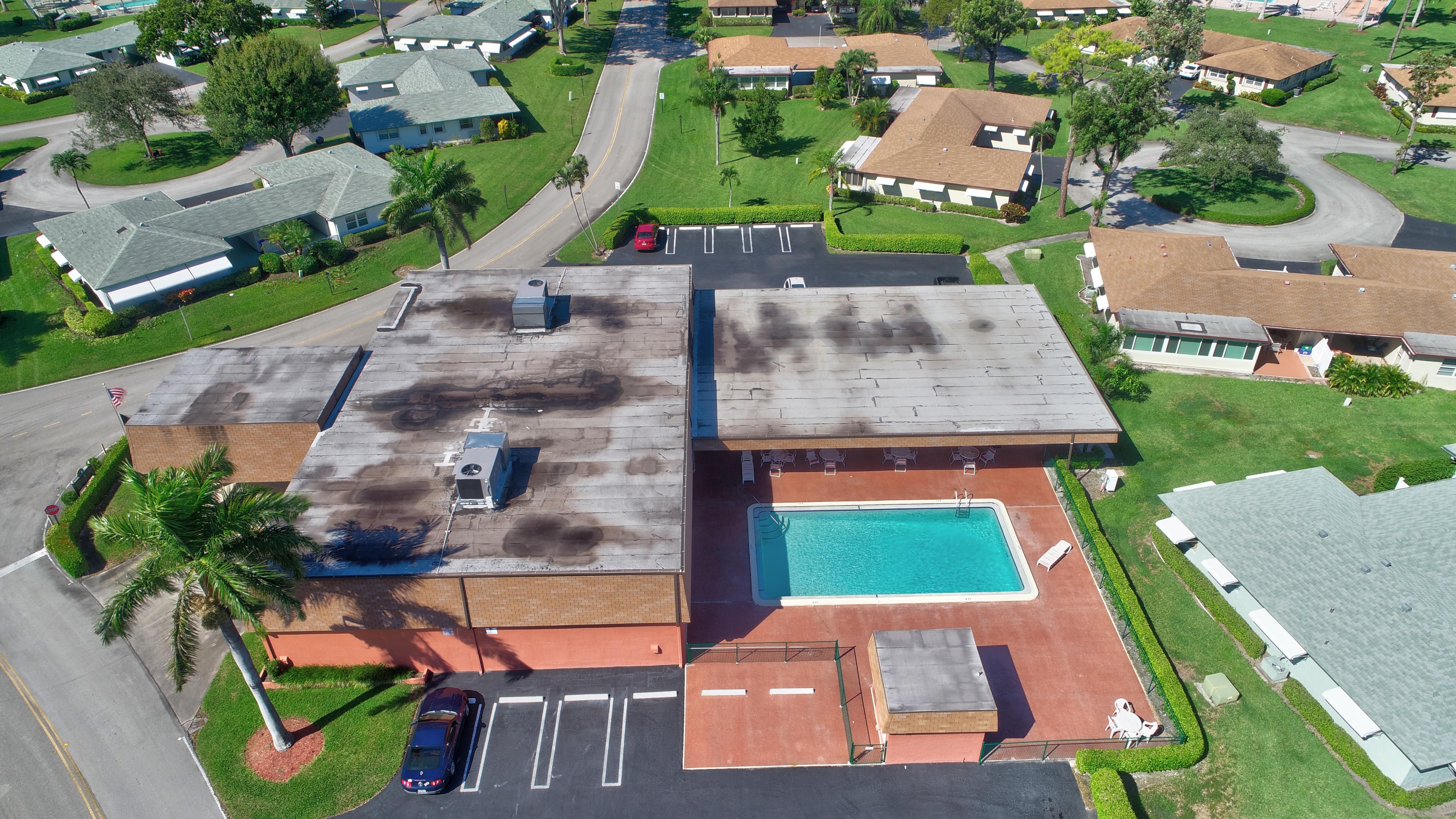 Aerial view of Country Manors community and pool in Delray Beach