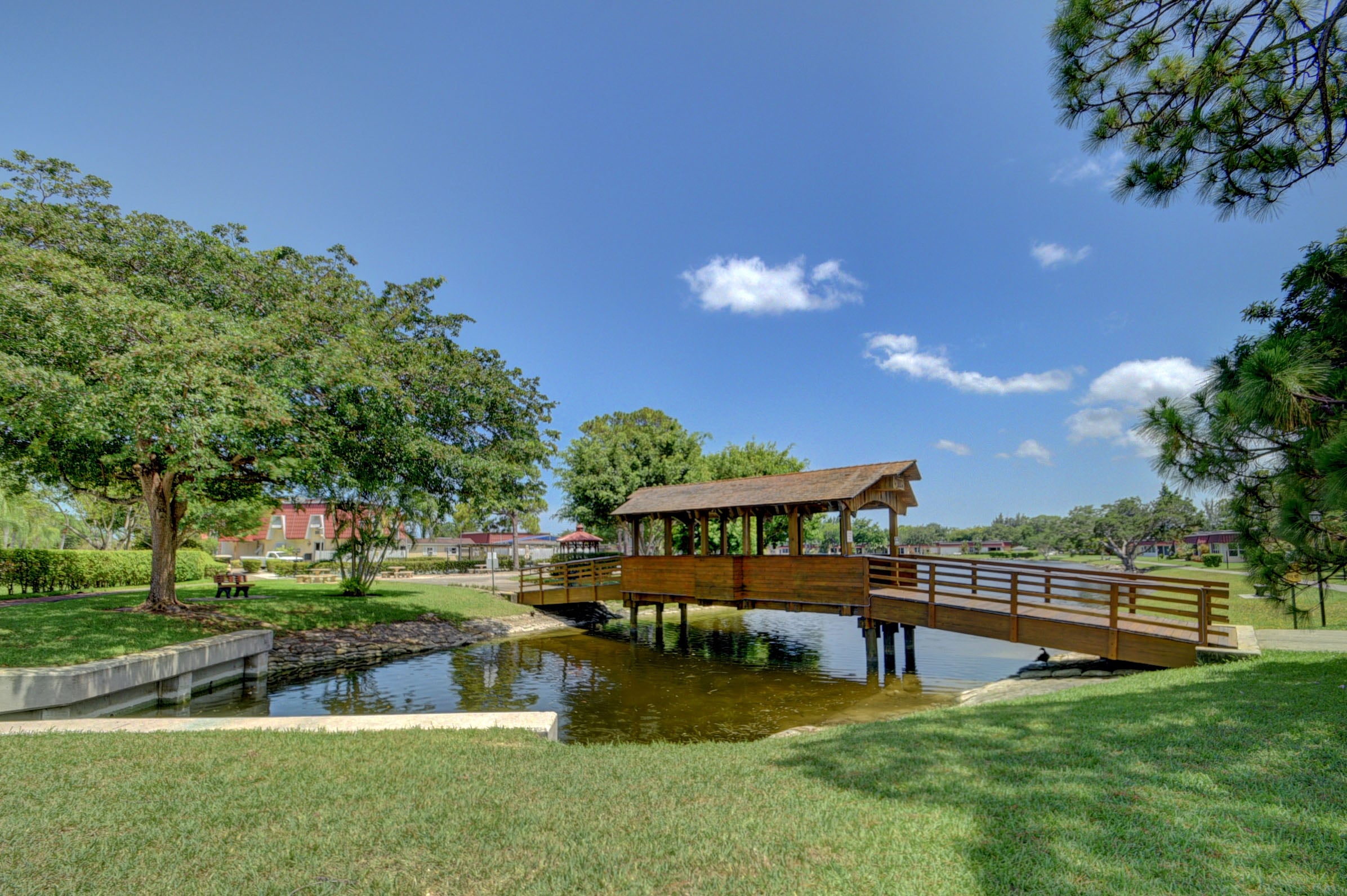 Covered bridge beside a lake at Covered Bridge