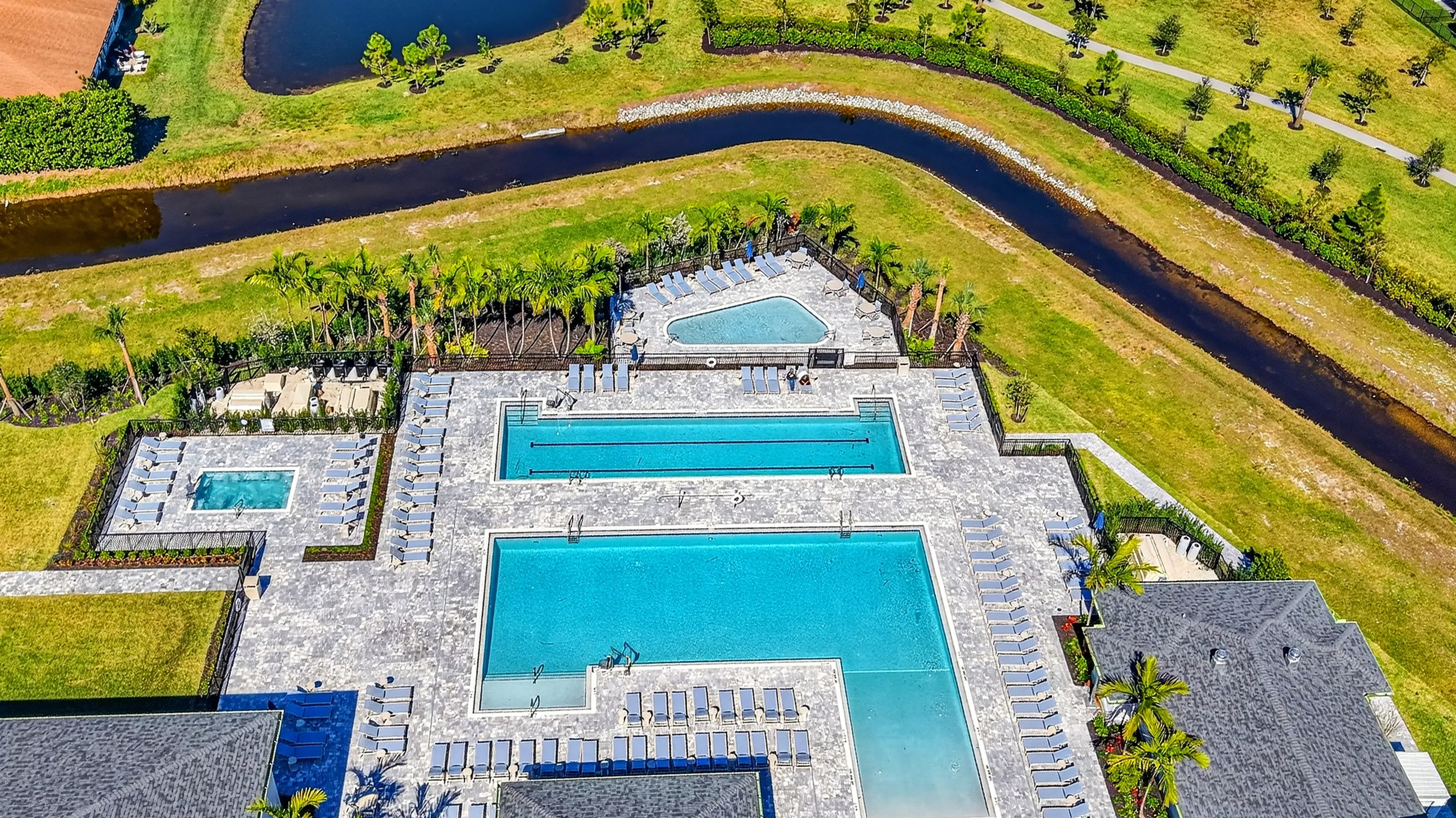 Aerial view of a South Florida active-adult clubhouse and pool setting