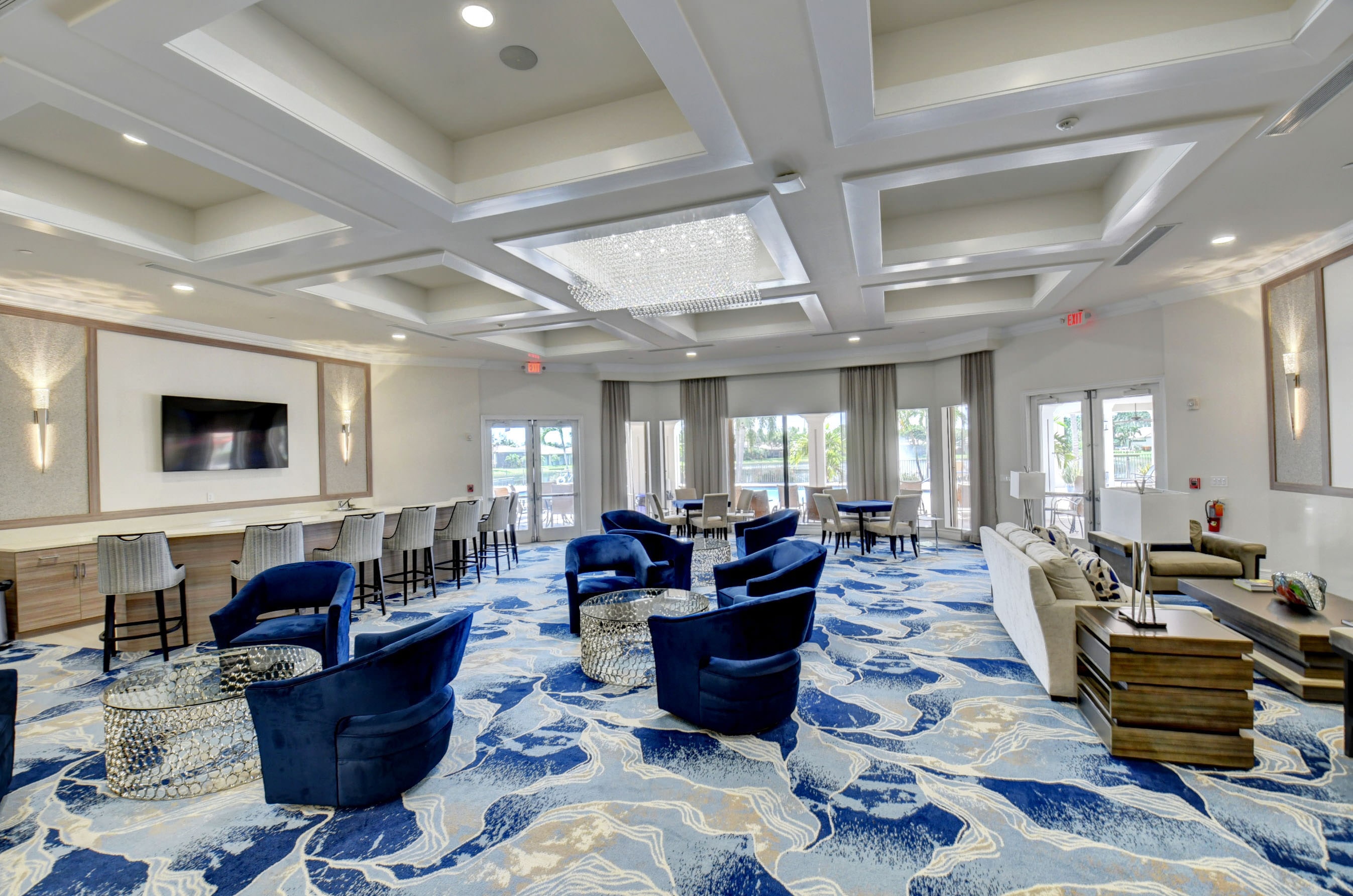Clubhouse lounge with seating at Four Seasons at Delray Beach
