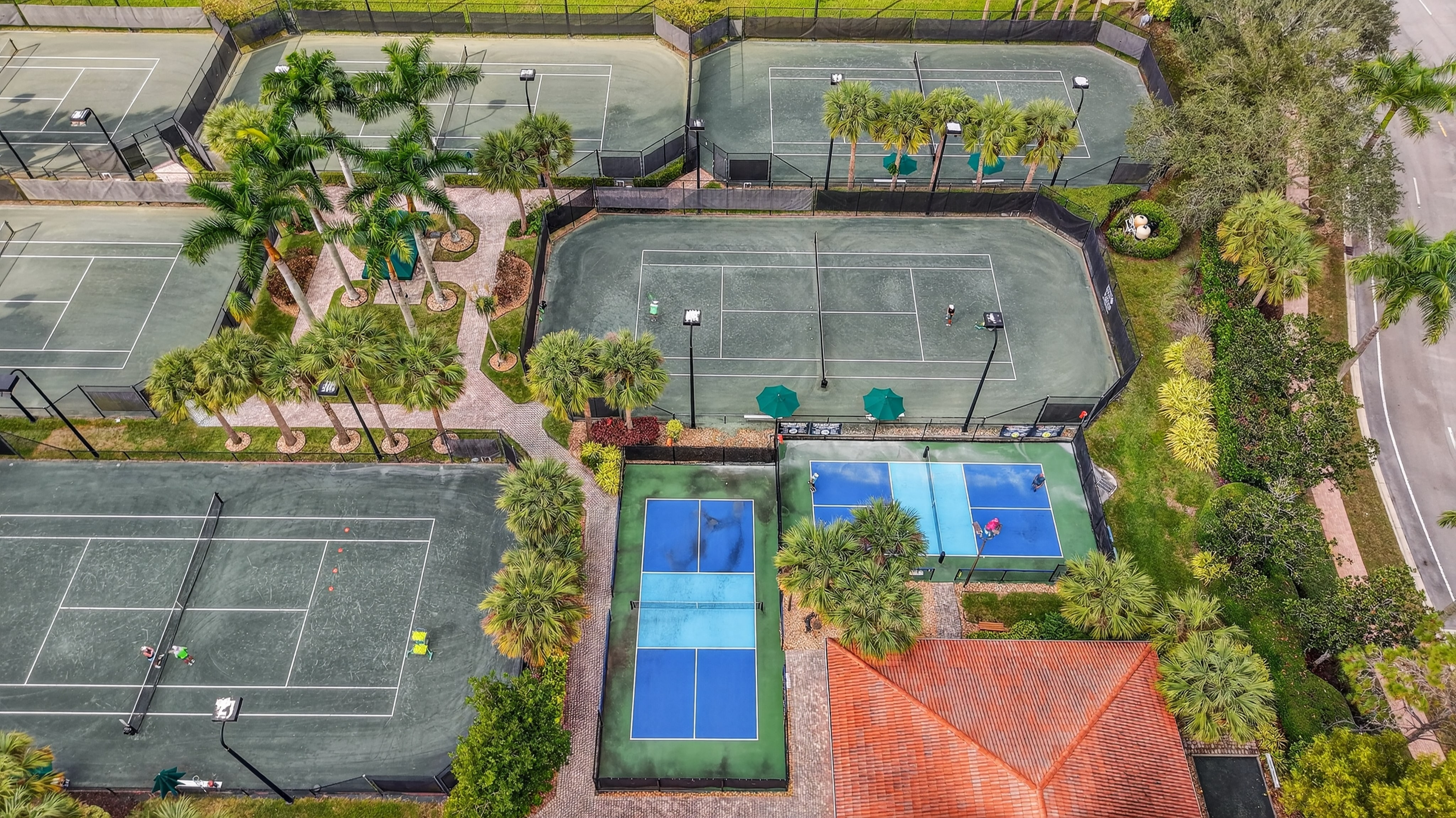 Aerial view of tennis and pickleball courts at Four Seasons at Delray Beach
