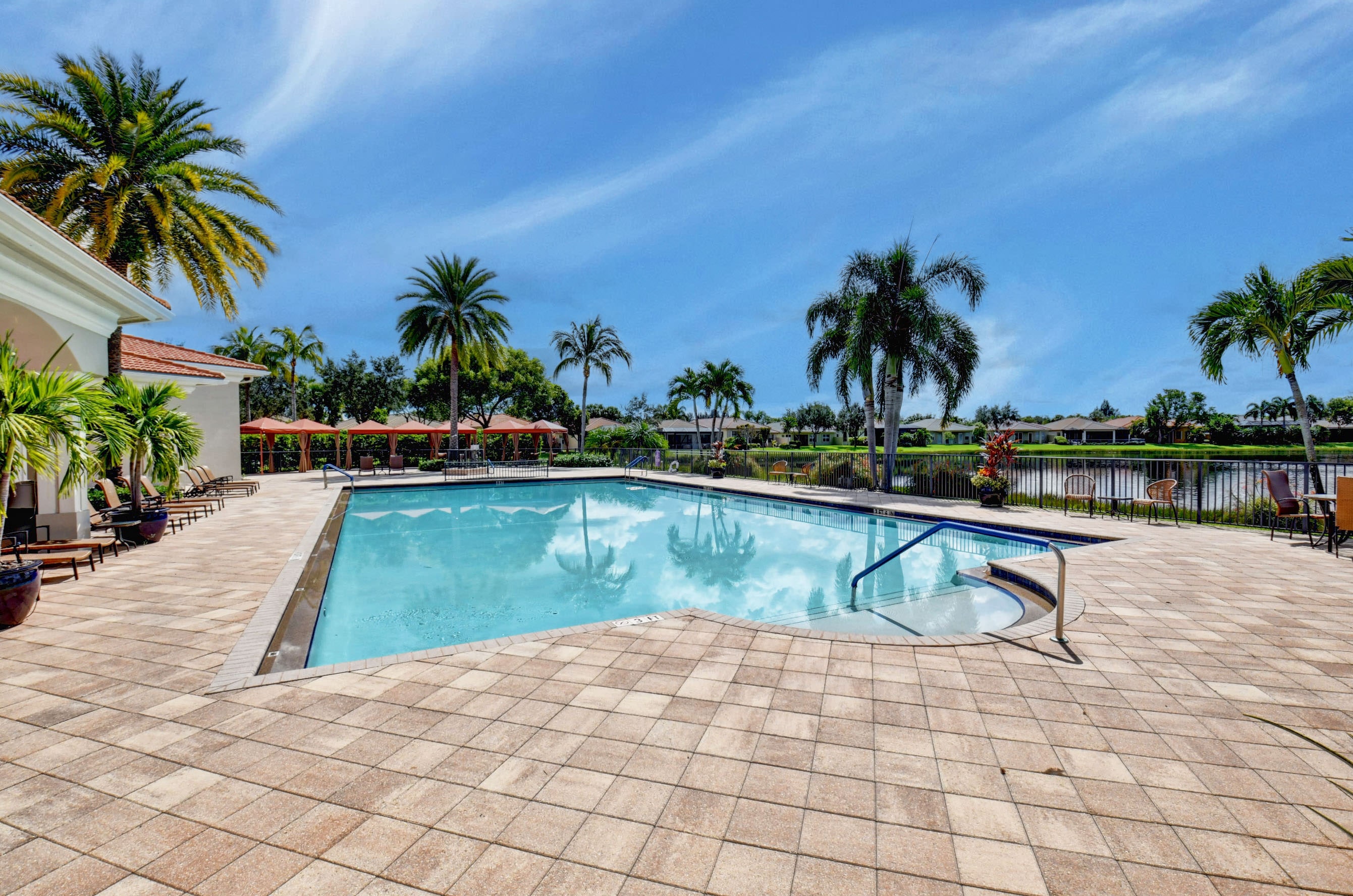 Outdoor community pool at Four Seasons at Delray Beach