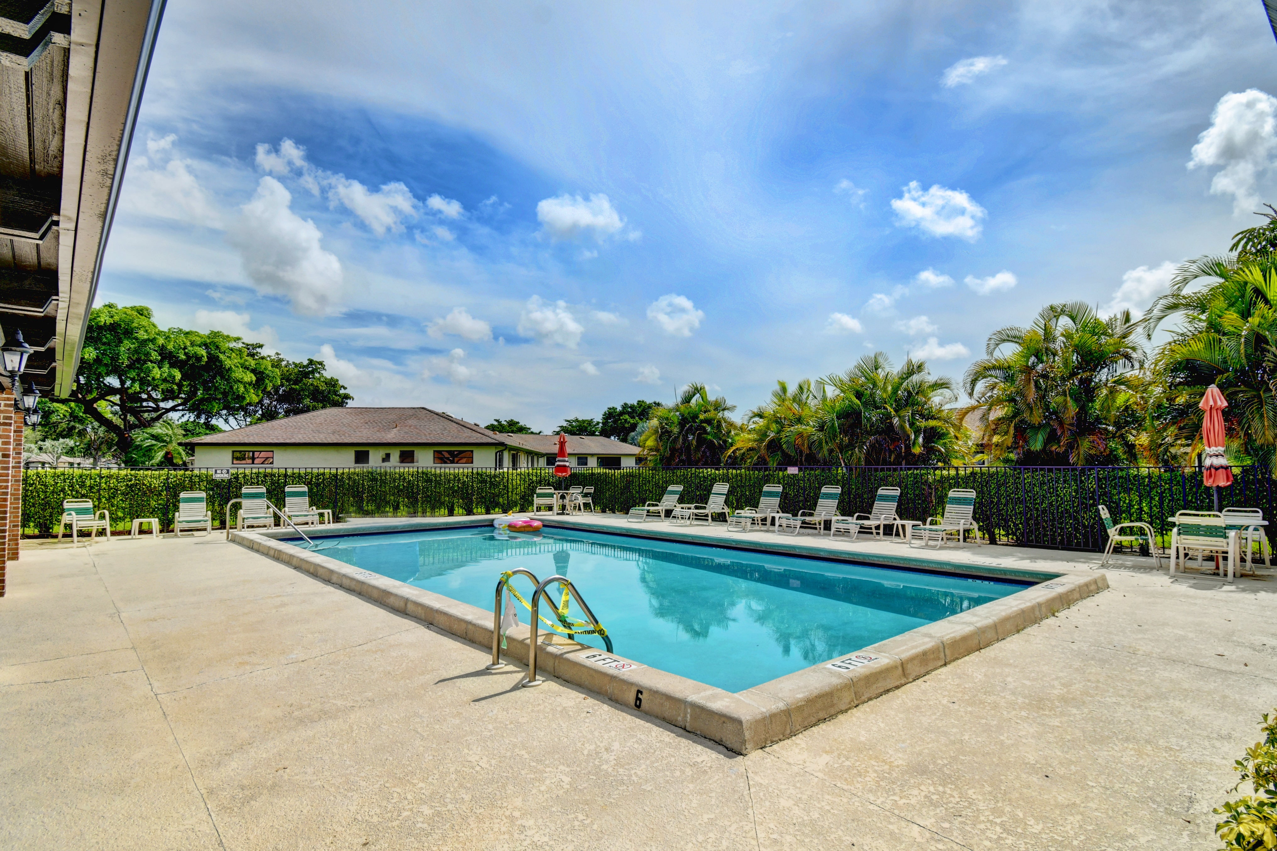 Greentree Villas outdoor community pool and clubhouse