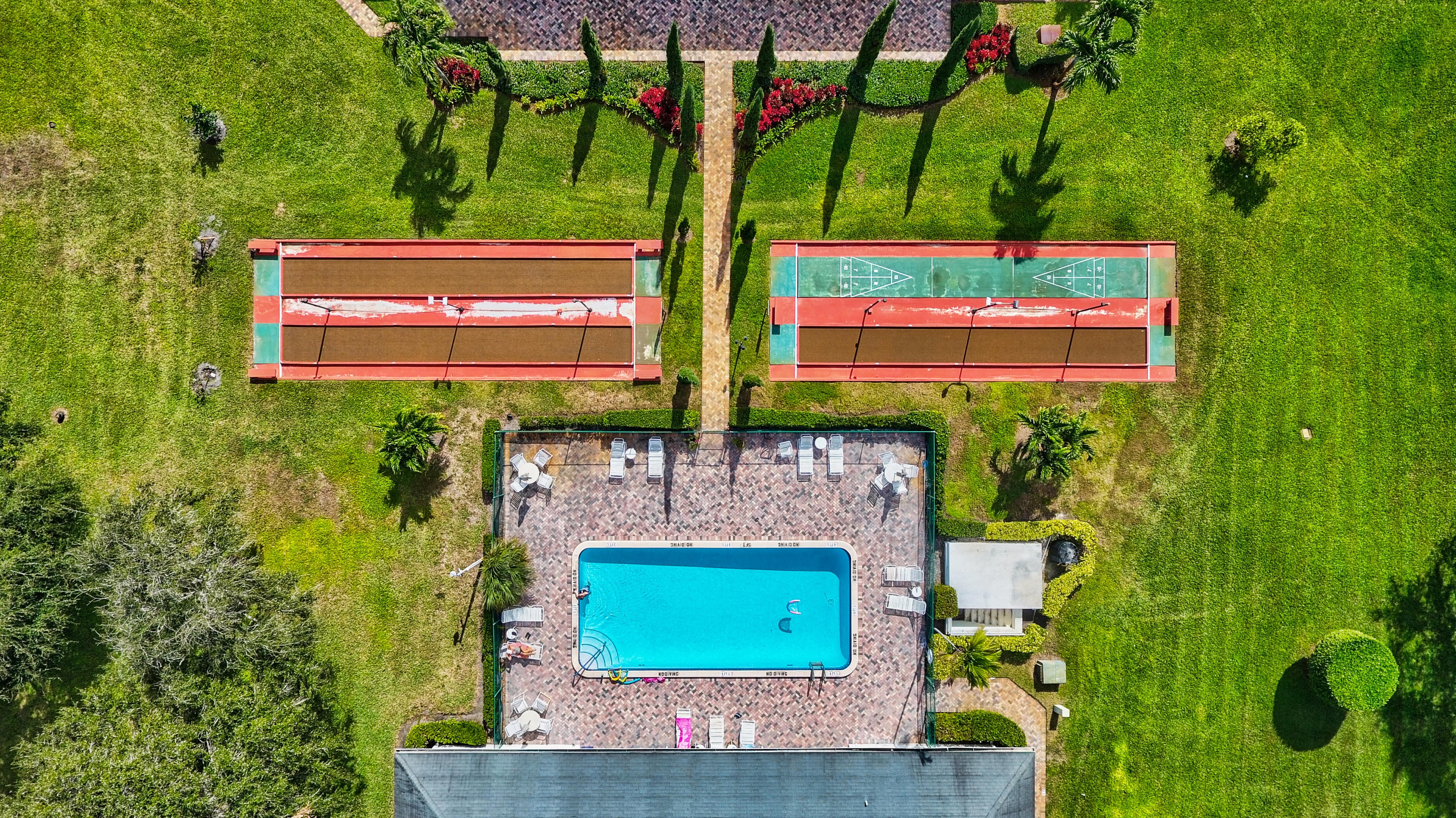 Aerial view of the Limetree pool and shuffleboard courts