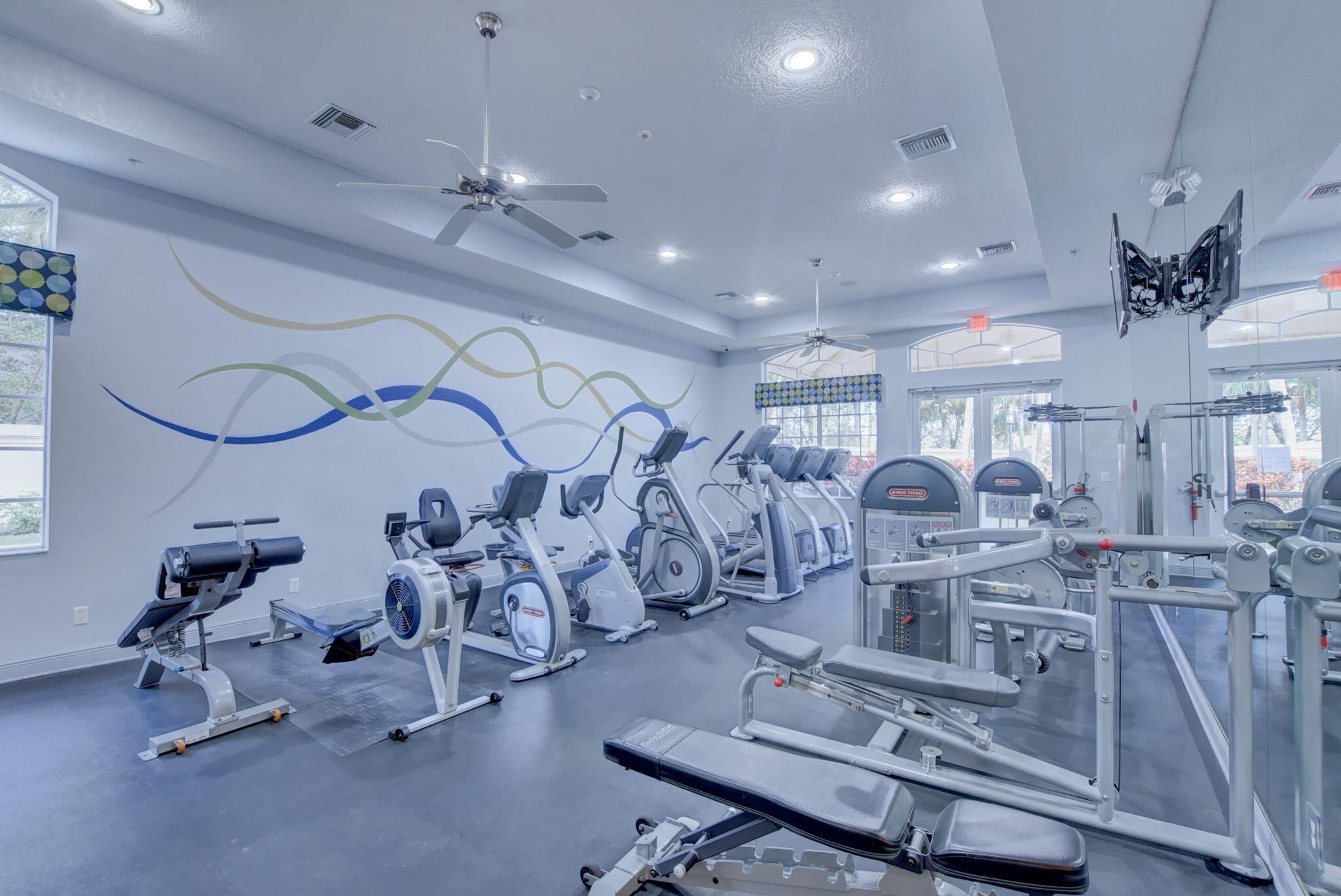 Fitness center cardio equipment at Mizner Falls