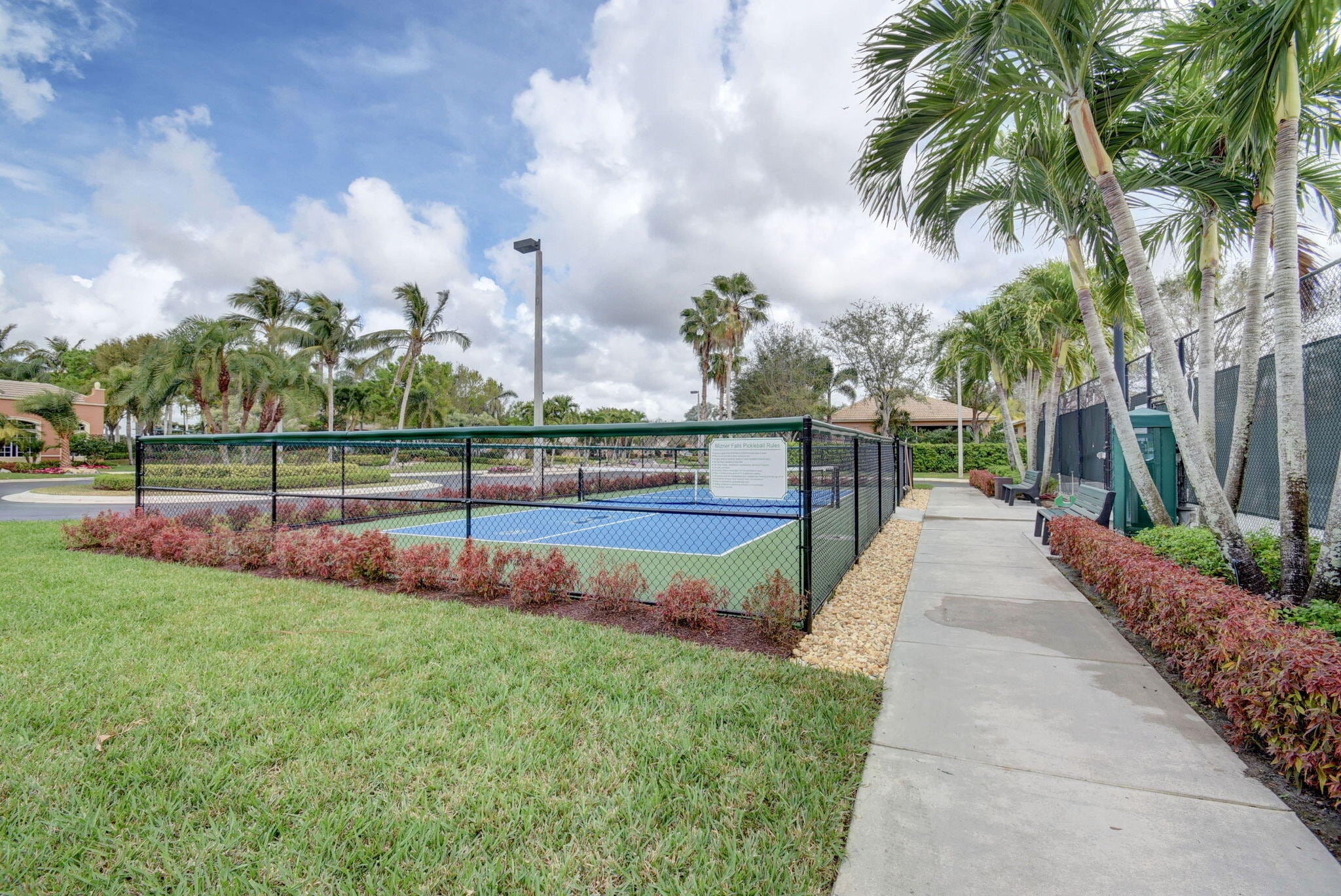Tennis courts at Mizner Falls