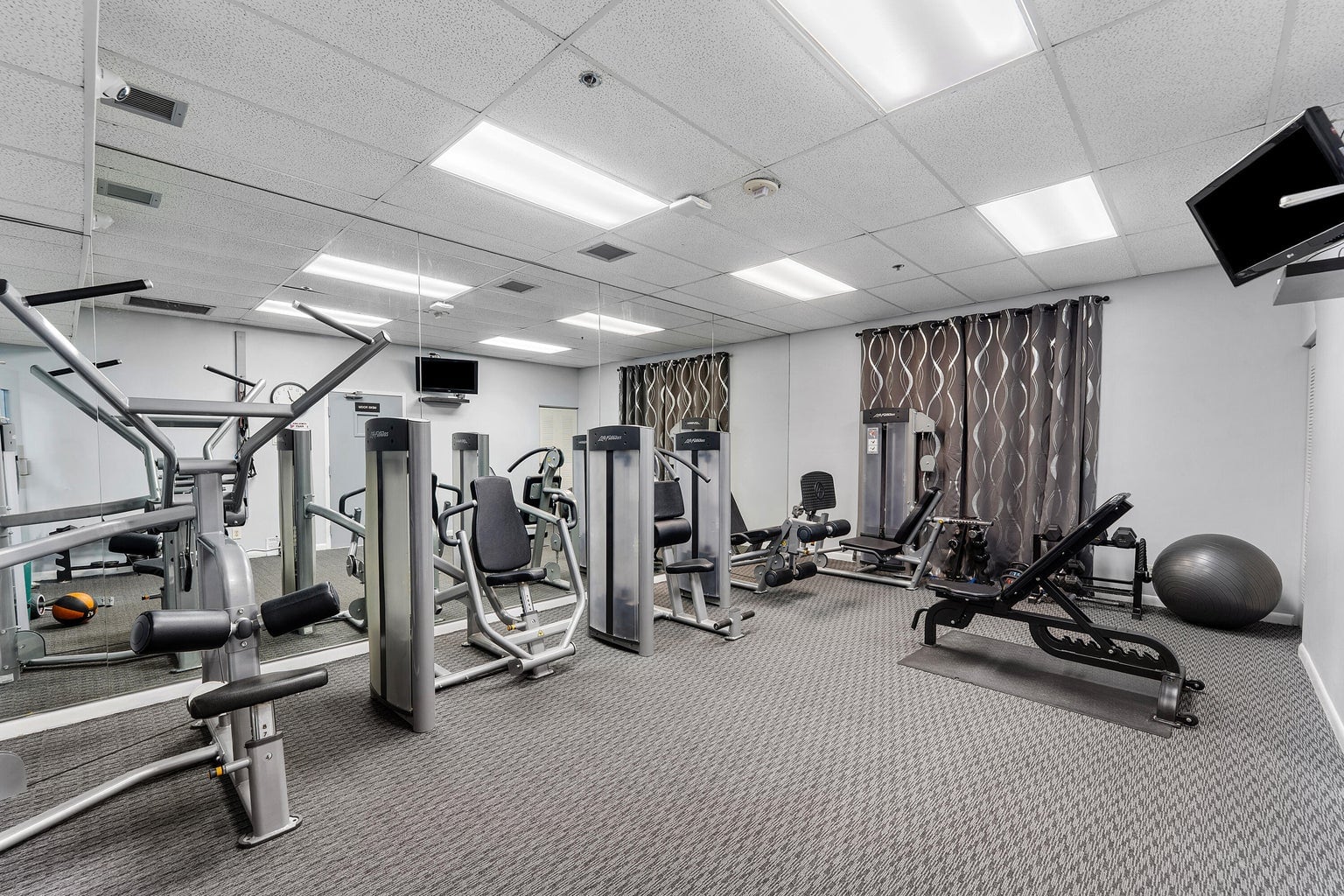 Strength equipment at Palm Chase fitness center